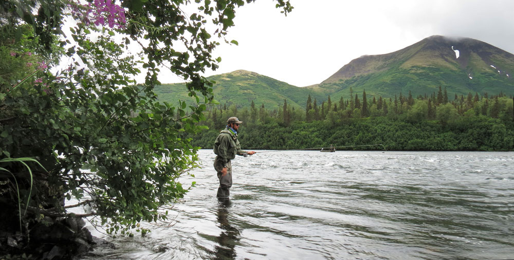 Fly fishing the Alaskan backcountry. Bryan Huskey photo via Bristol Bay Lodge.