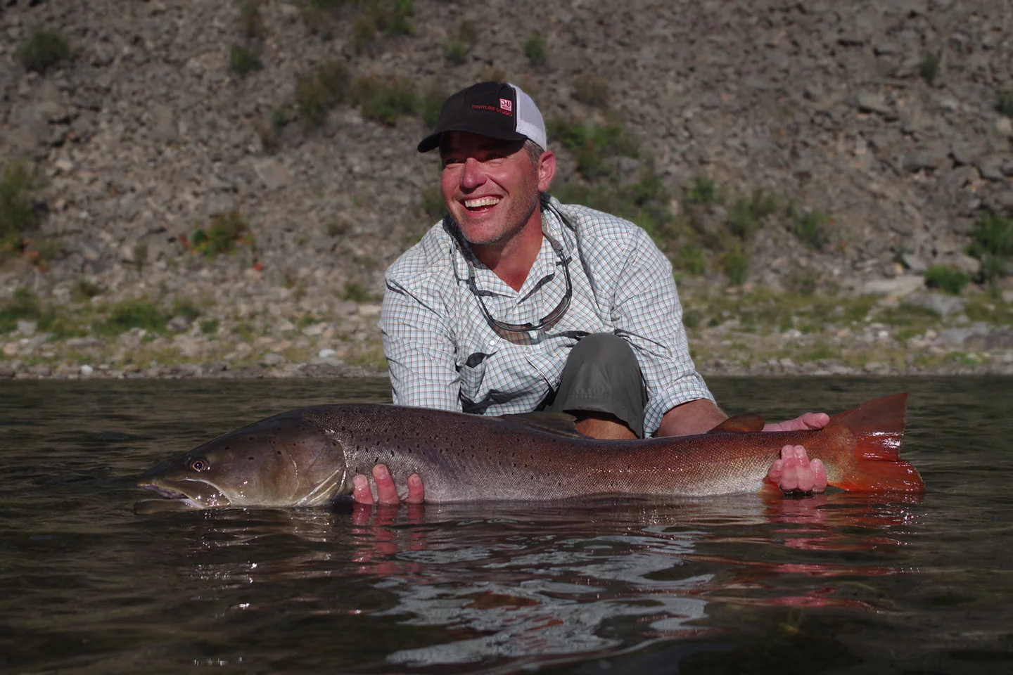 Josh Udesen with a 45" Taimen showing its true colors. Photo: Mark Portman