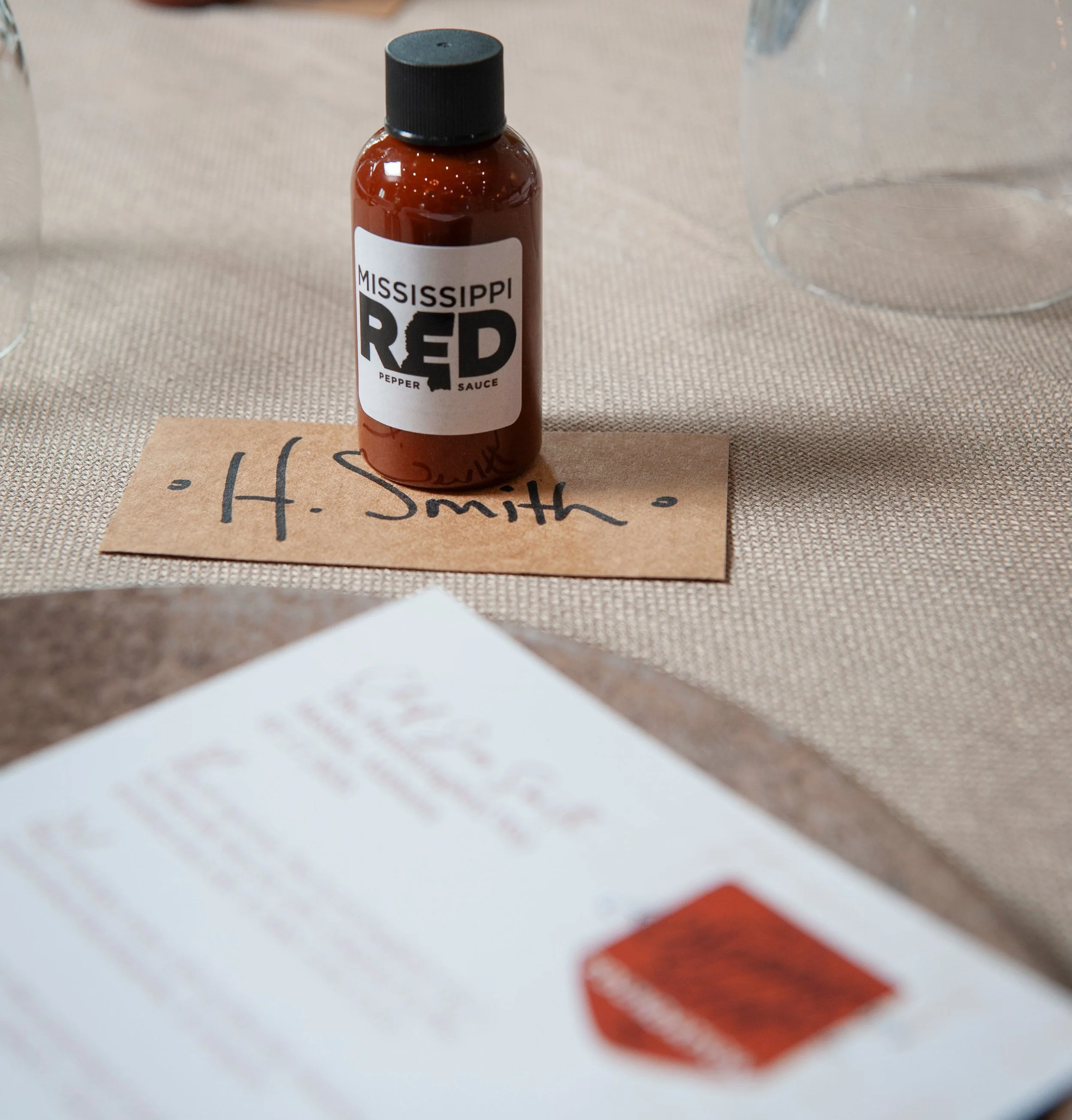 We come bearing gifts! 🎁🌶️❣️ You may have noticed mini-sample bottles of @msredpeppersauce perfectly placed at each guests&rsquo; seats! Our very own Advisory Board Member and OG Chef @tythames has crafted a masterful hot sauce &ldquo;must&rdquo; u