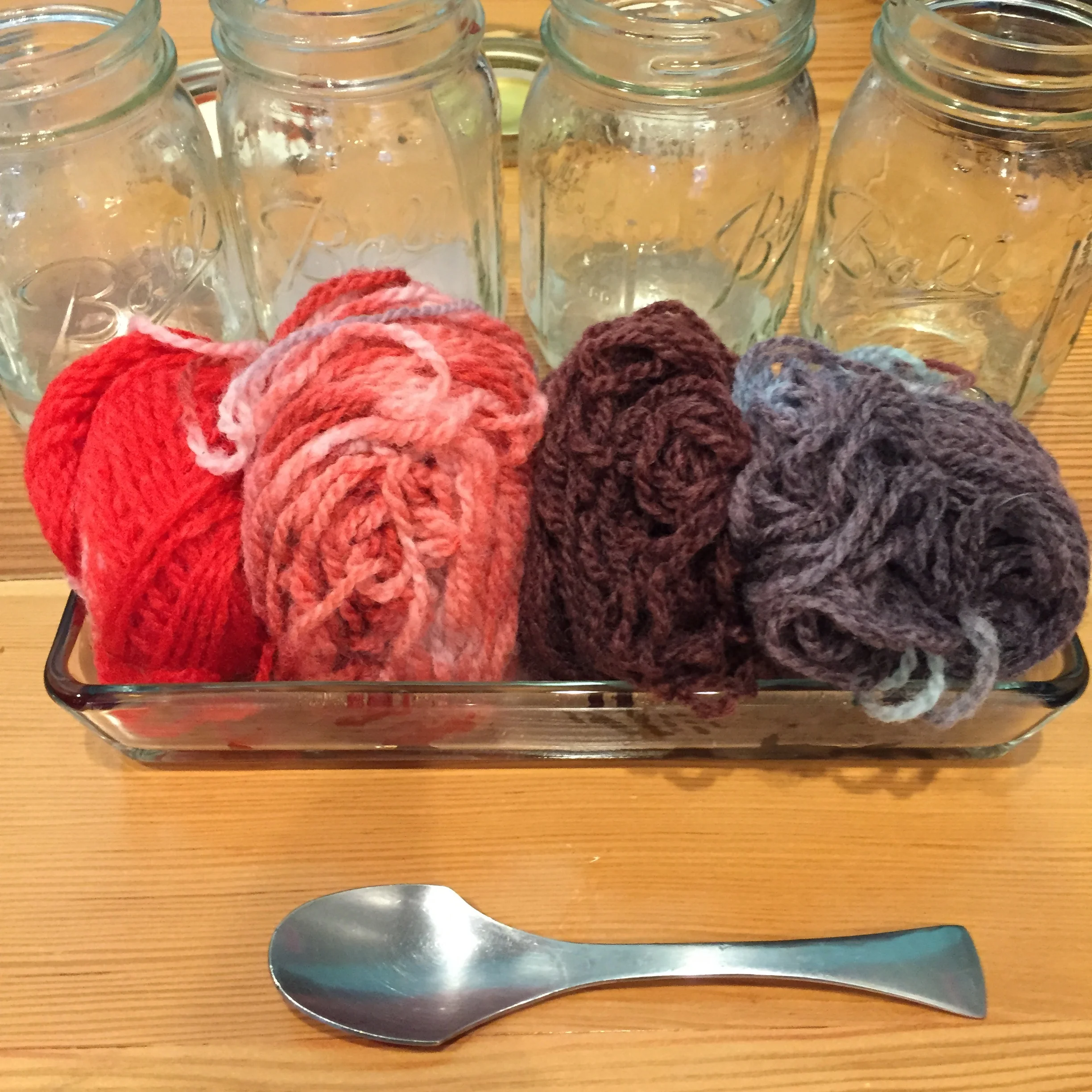 I squeezed as much water out of the little bundles of yarn and placed them in a dish to dry. My hands smelled so much like Kool-Aid that I ended up feeling pretty nostalgic for my childhood.