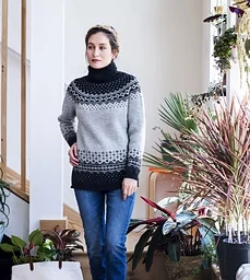 Rainier is worked in the round from the bottom up. The sleeves cuffs and hem begin with a long tail tubular cast on, and then a 1-by-1 ribbing is worked. Colorwork adorns the bottom of the sleeves and sweater body. Download from Ravelry Here