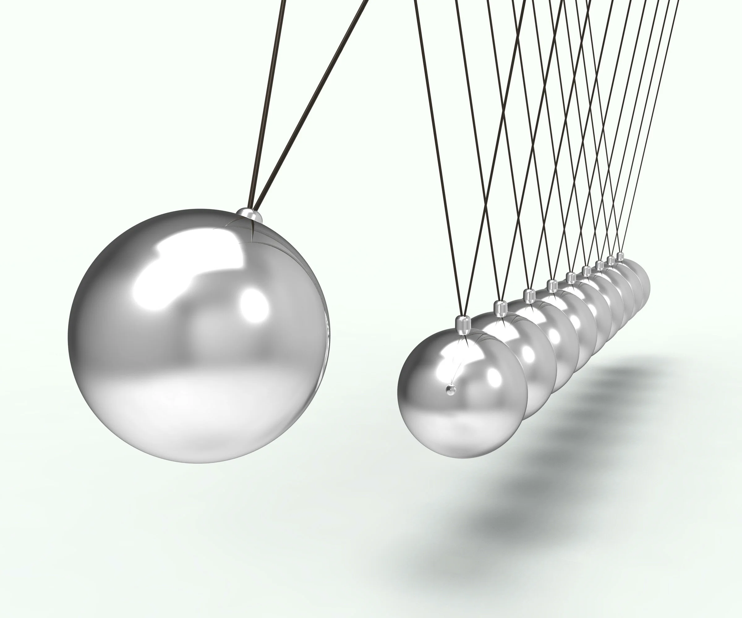 Newtons cradle showing energy and gravity.JPG