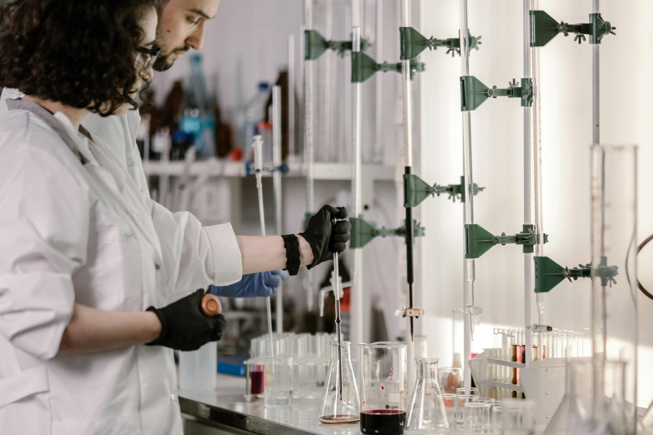 Lab-stands-pexels-mikhail-nilov-8851786.jpg
