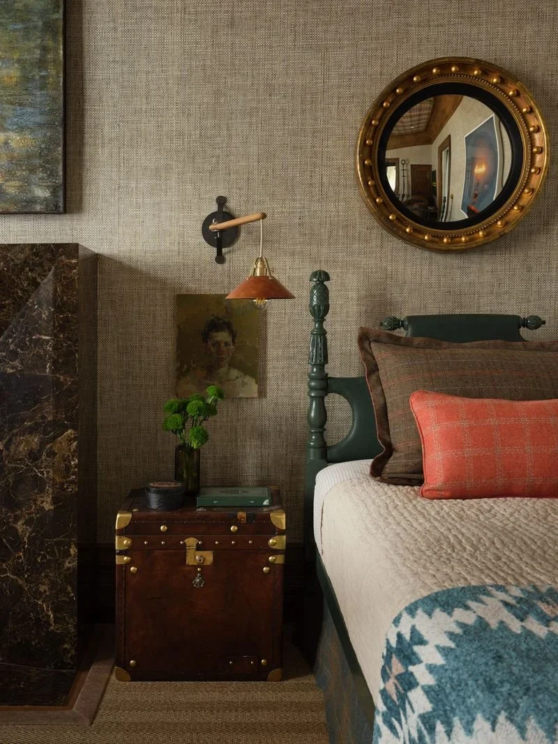 Twin bed lacquered in custom green by Revitaliste with trunk nightstand and antique portrait in Jeffrey Neve Interior Design's Double Standard bedroom at the 2026 San Francisco Decorator Showcase