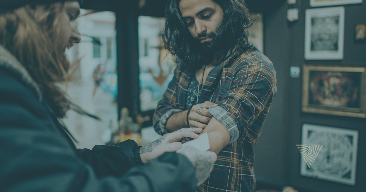 Tattoo artist working in a St. Louis tattoo studio