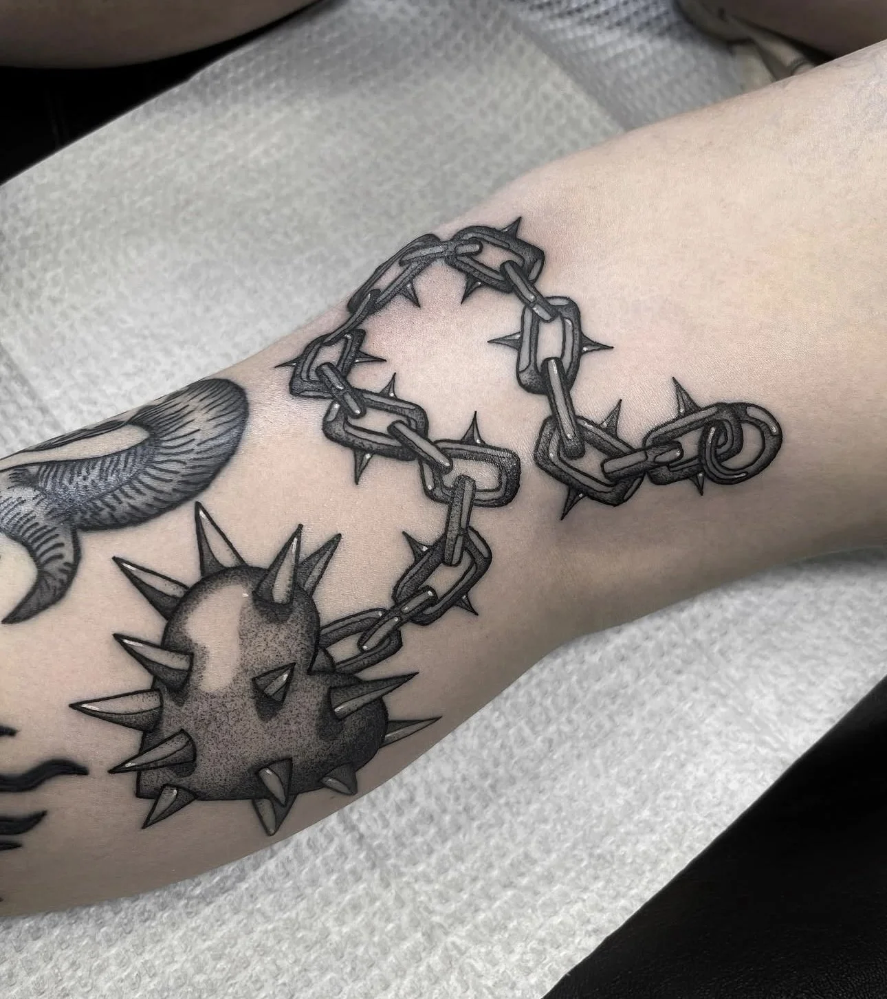 blackwork flail tattoo by st louis artist Ayanah