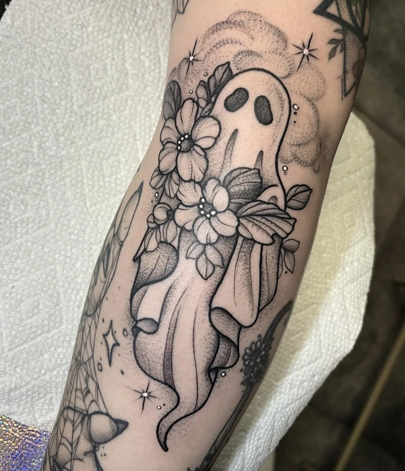 floral ghost blackwork tattoo by ayanah st louis