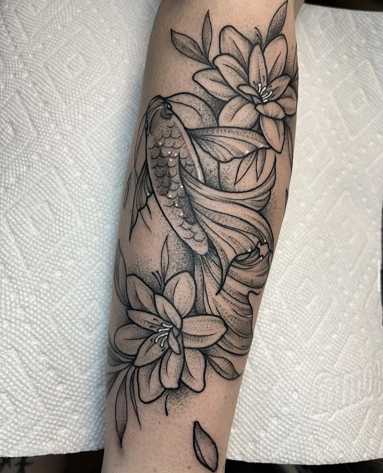 floral fish blackwork tattoo by ayanah st louis