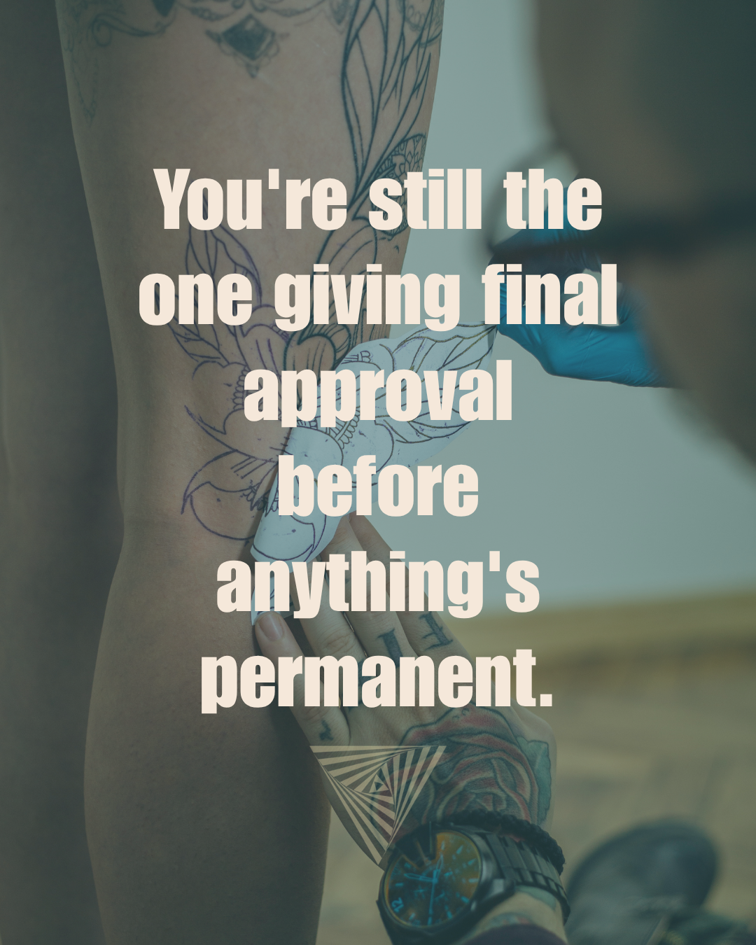 Client reviewing a tattoo stencil before their appointment