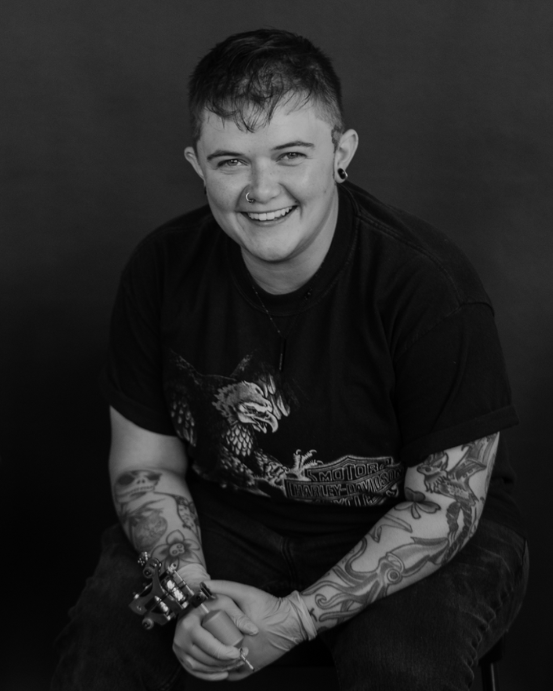 Image of a female tattoo artist in St. Louis, MO