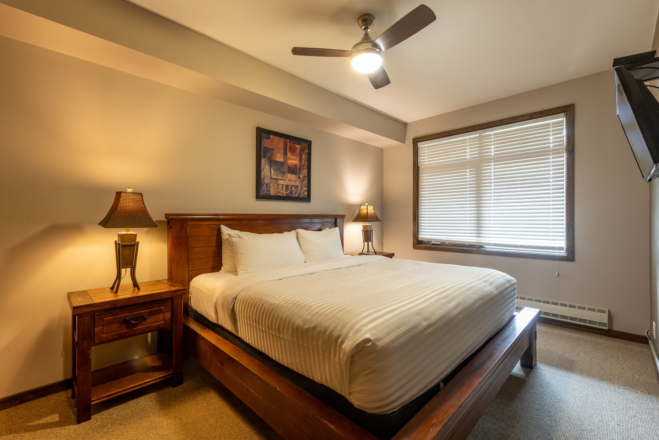 Cozy Bedroom in Glacier Mountaineer Lodge | Two-Bedroom Suite