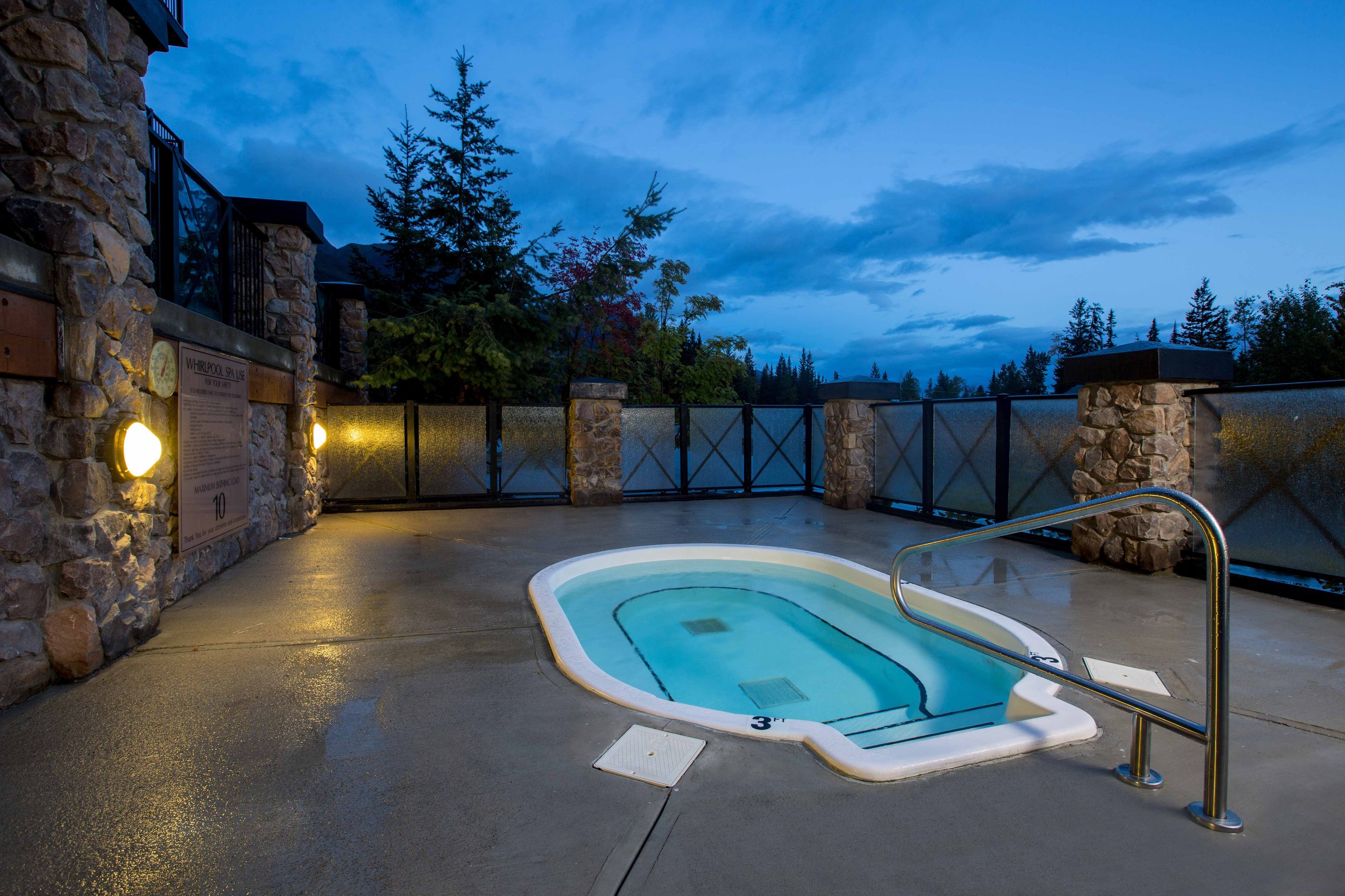 Relax in the Outdoor Hot Tub at Glacier Mountaineer Lodge