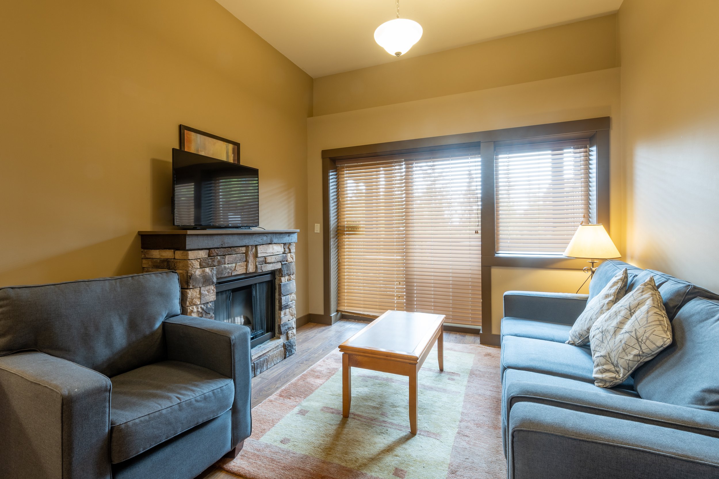 Cozy Living Room | 2 Bedroom Hot Tub Suite at Palliser Lodge