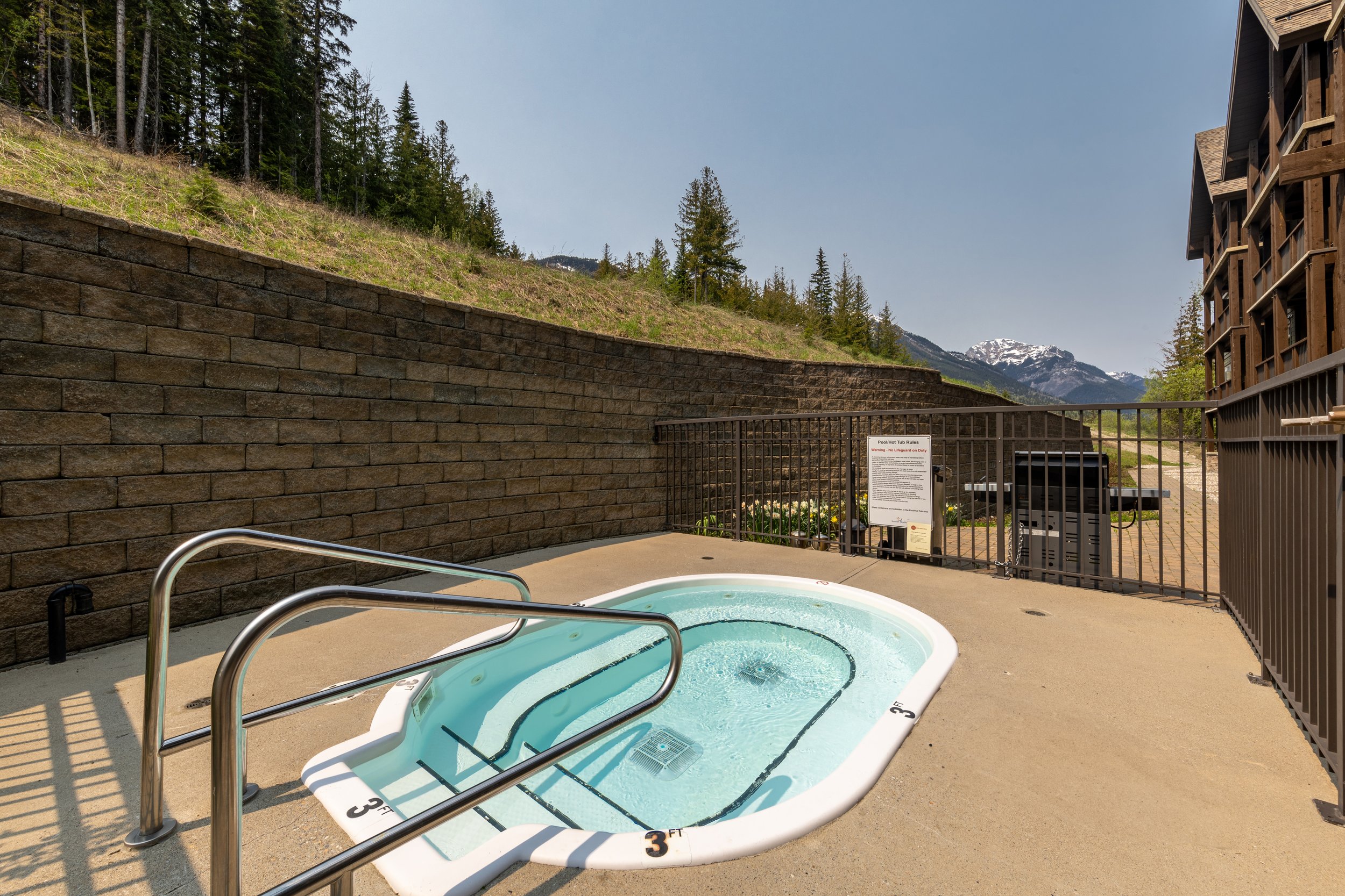 Relaxing Outdoor Hot Tub at Palliser Lodge