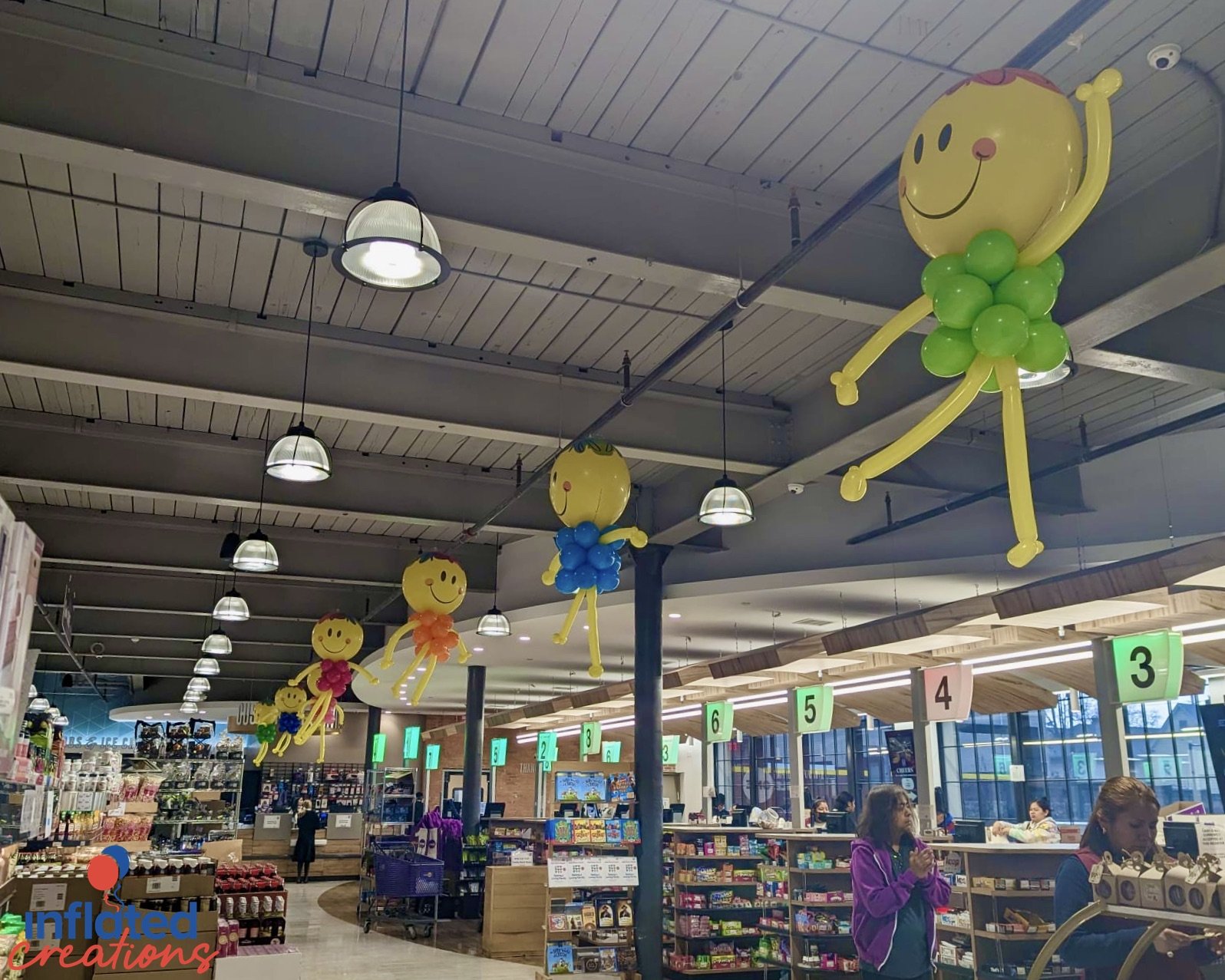 balloon clown characters smiley guys grocery store ceiling aisles decor