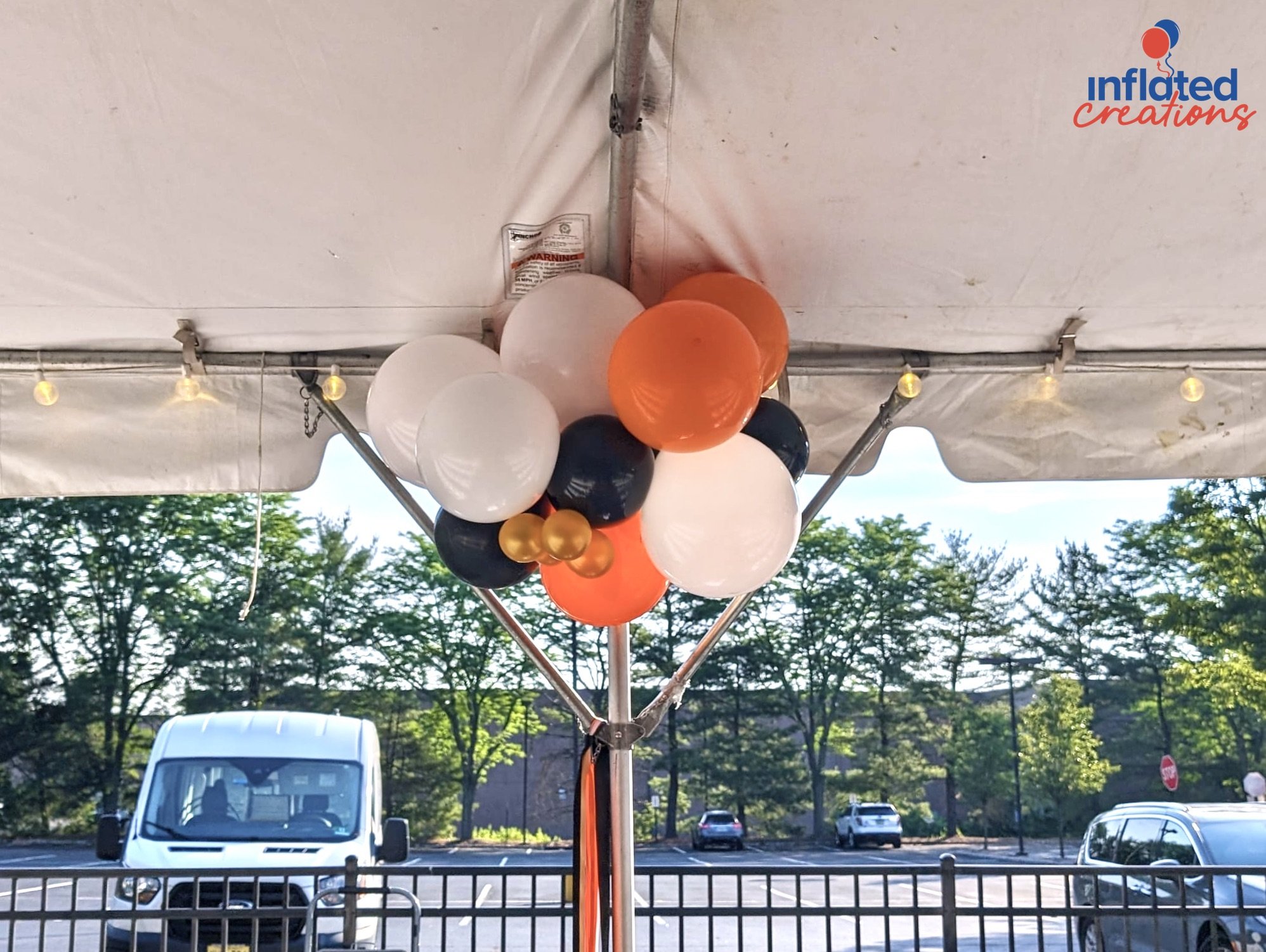 balloon bundle organic topiary tent event.jpeg