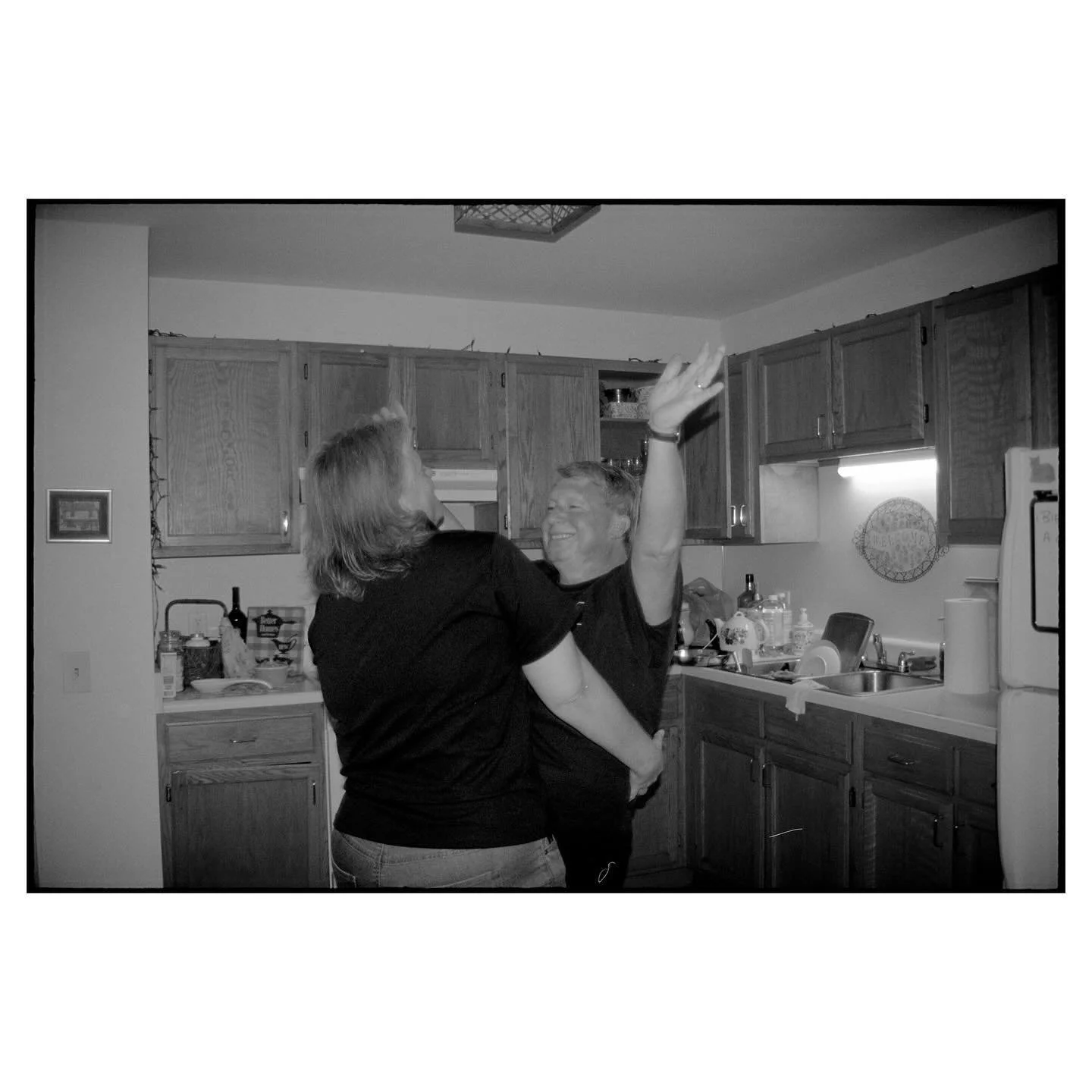 Sometimes you just have to dance it off. Captured a few moments of my parents dancing during a very hard time towards the end of my grandmother's life. As a working class family, the burden of taking care of her during the grueling last months of her
