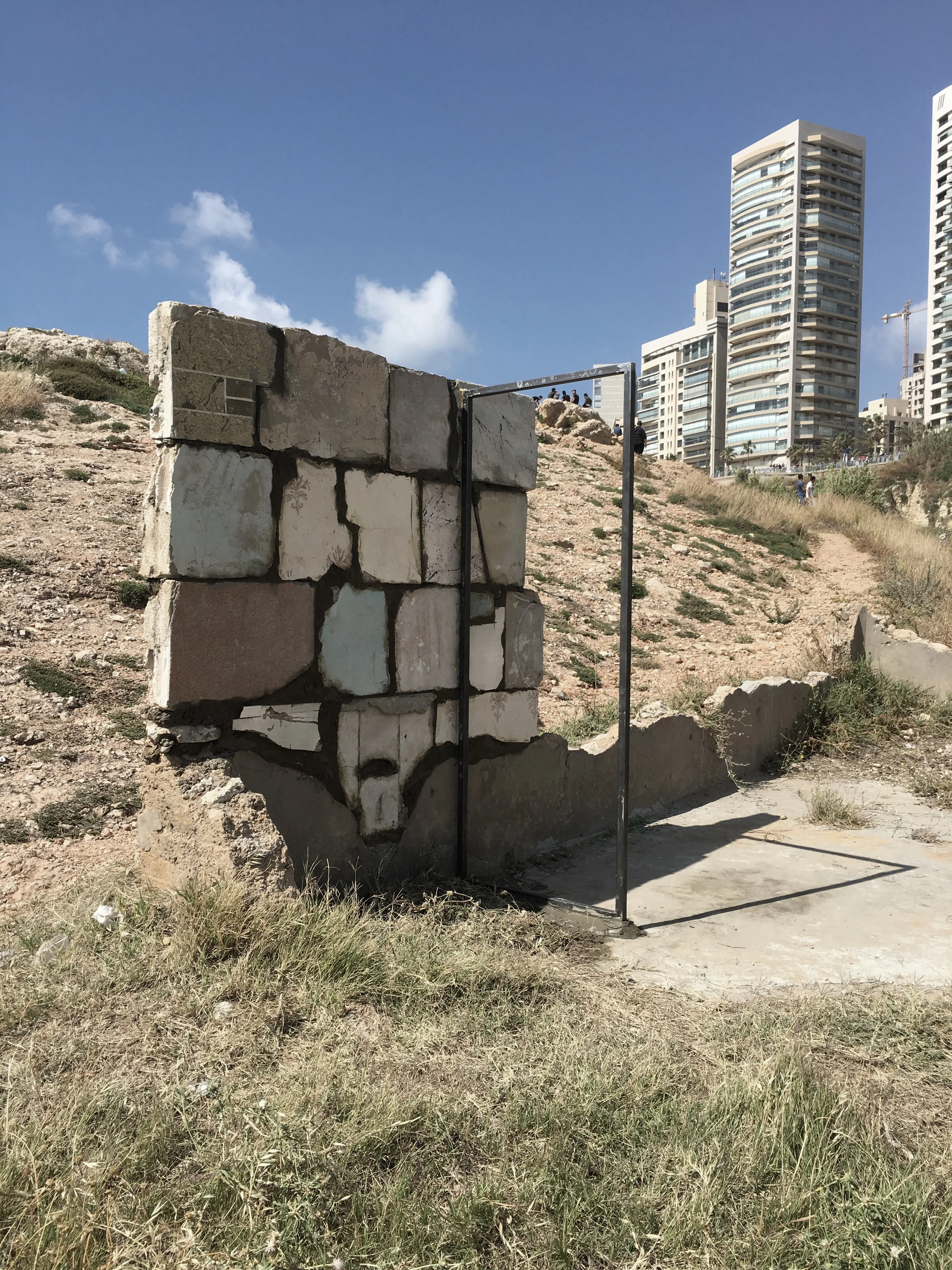  'New Order' brings together fragments of various ruins from the site. These pieces were cut and re-assembled to continue an existing ruin and to create and actively enacted memorial that tells about the history and transformation of this very site. 