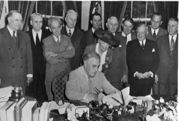 photo, left, President Roosevelt signing “G.I. Bill,” courtesy of FDR Library
