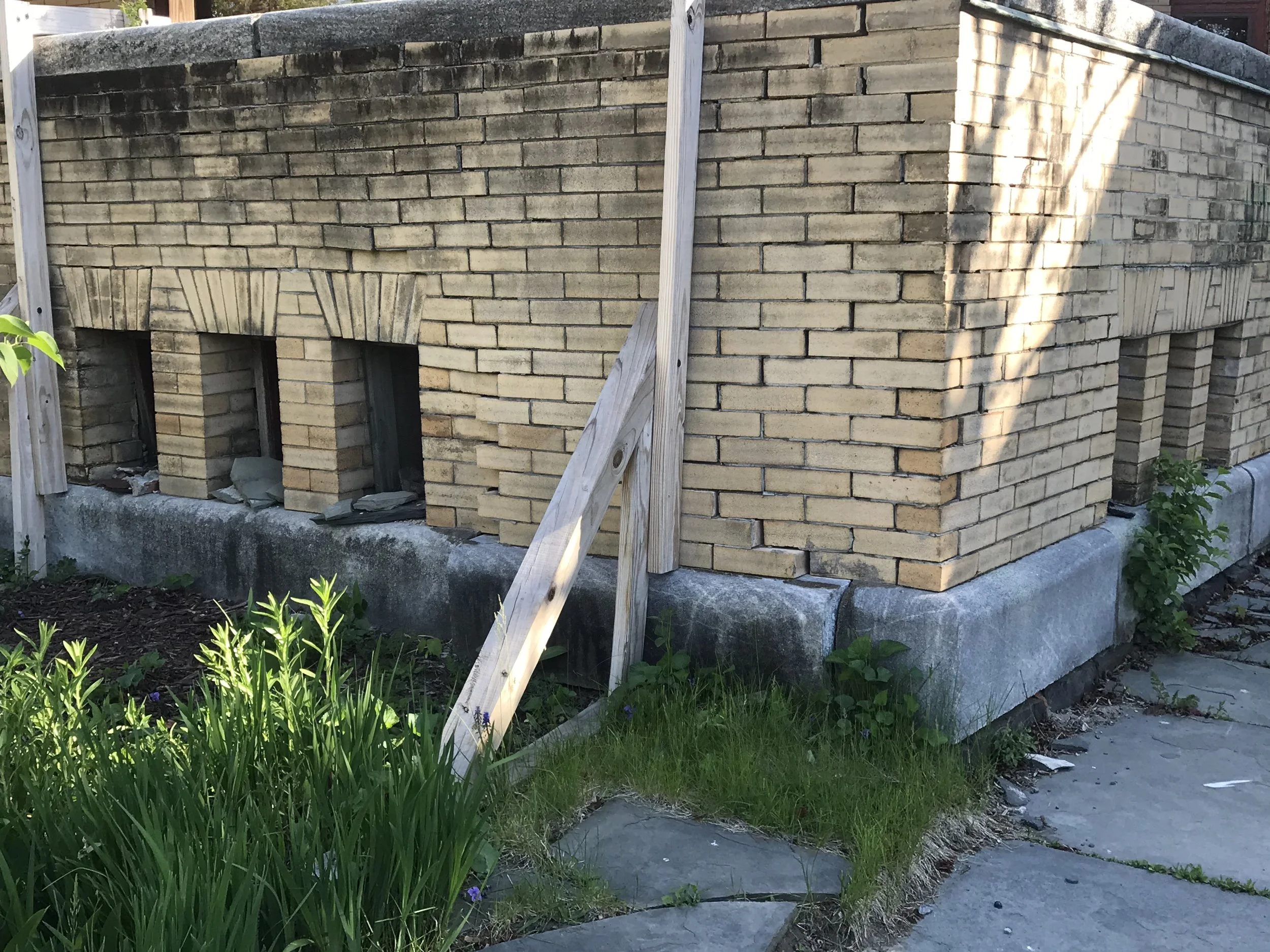 before - crumbling porch corner.JPG