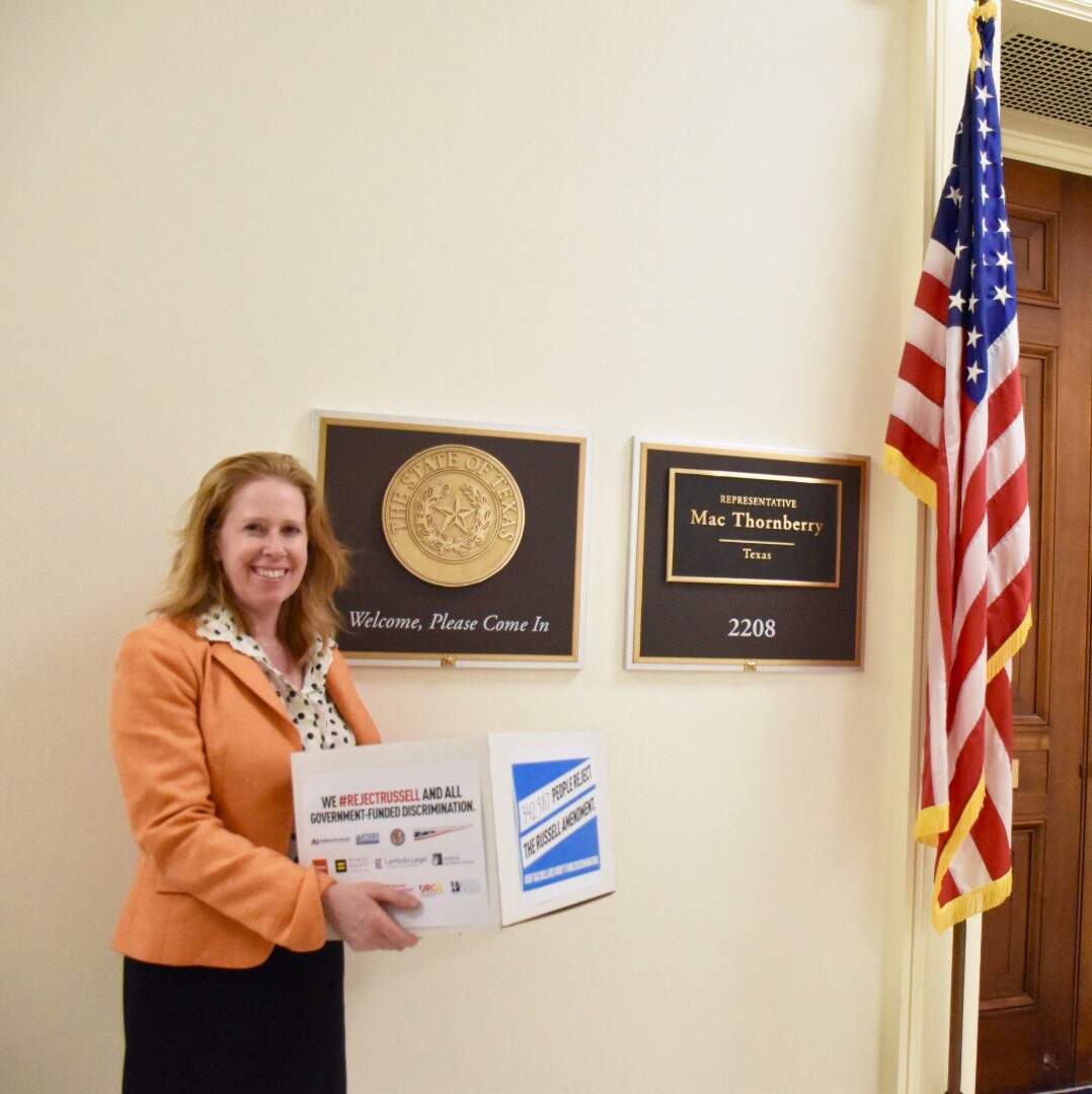  Americans United's Legislative Assistant Director Dena Sher delivering petitions. 