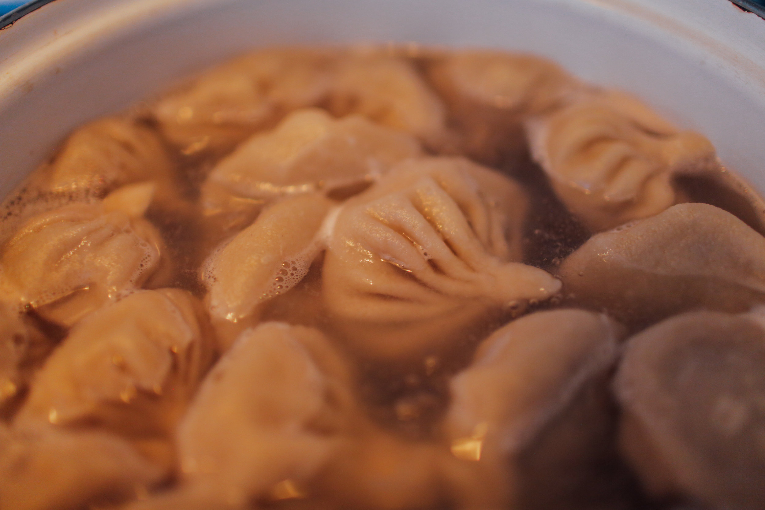  19. Add dumplings to boiling water, bring to a simmer again, and cook for 10-12 minutes. 