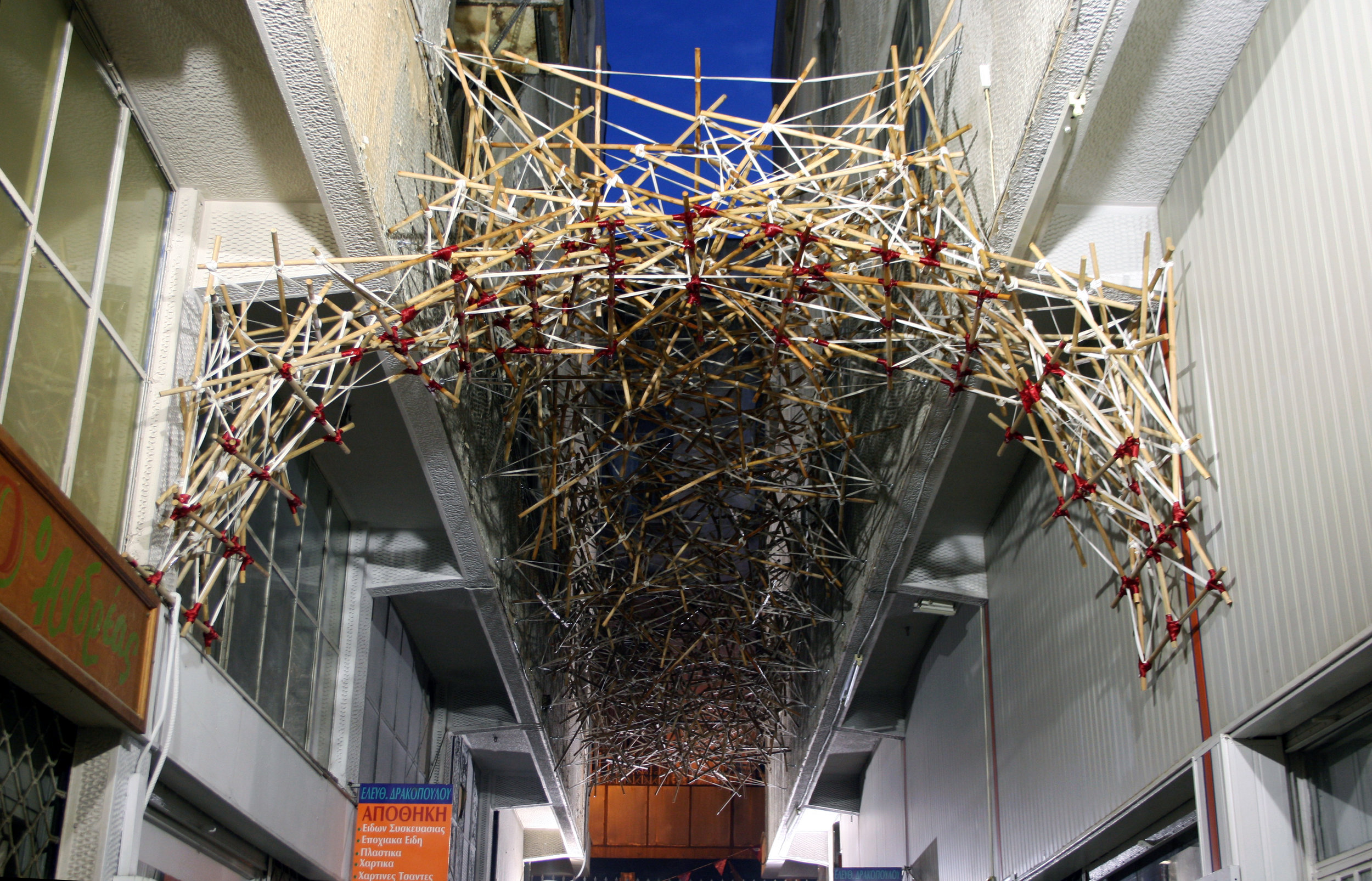   Knitting History , 2017 wood, rope, ribbon 12×5×3m  Removement 2017,&nbsp;Kairi Arcade, Athens, Greece(cur.:&nbsp;Maria Vasariotou) 