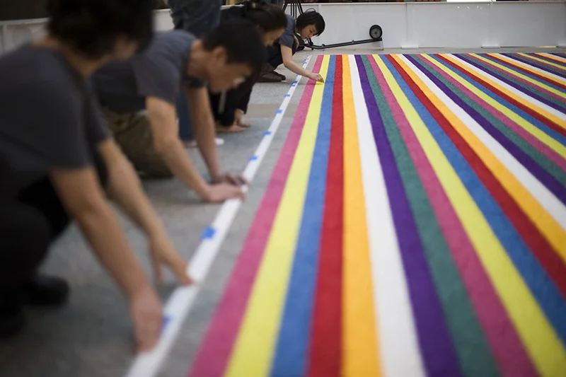 Spring Hiatus, 2011 / Lenox Mall, Atlanta, GA Shredded Silk Flower Petals, 192 " x 480 " (Installation in progress)