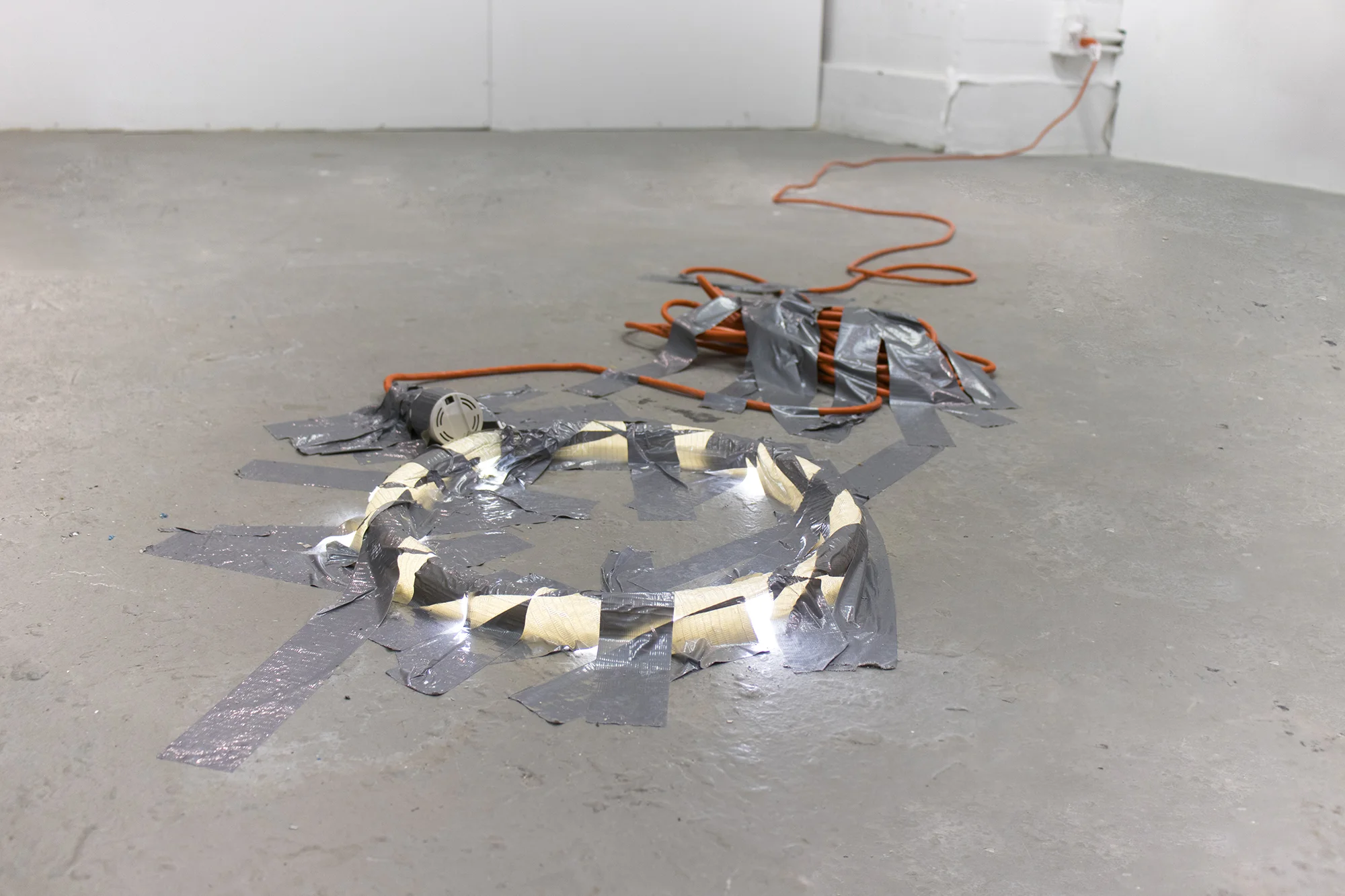 Bat-Ami Rivlin, Untitled (DUCT TAPE, LED, CORD, BALLAST) , 2019. Duct tape, LED circular light bulb, extension cord, ballast. Image courtesy of the artist.