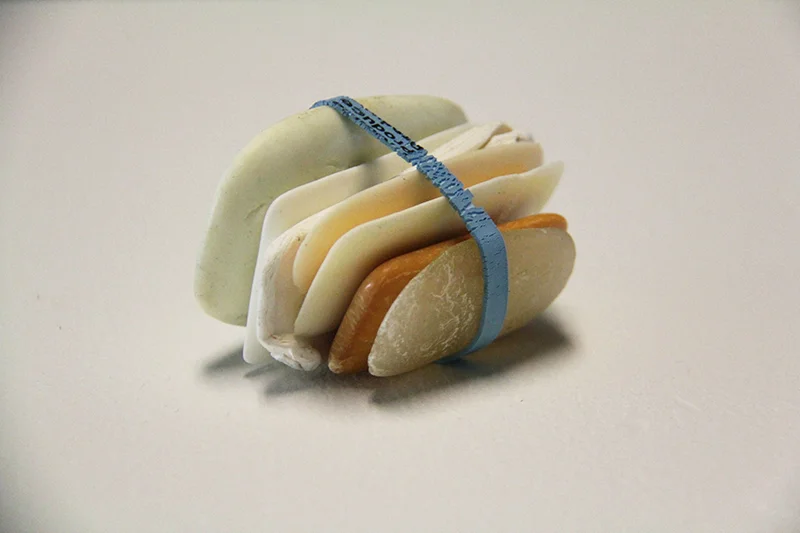 THE UNWANTED, Used soaps and rubber band, 3 x 2 x 2 inches, 2018