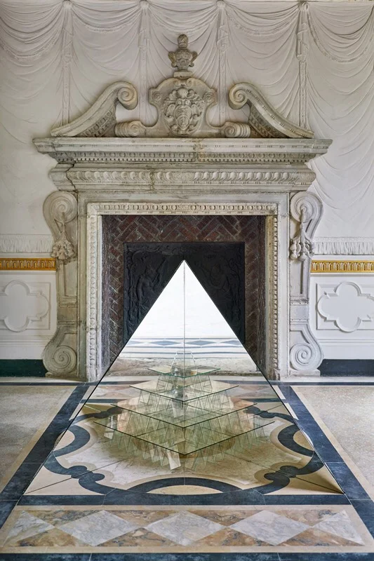 "Saturn Rings the Sunrise Bells", 2019. One-way mirror, fluorescent lights 62" x 41" x 22"