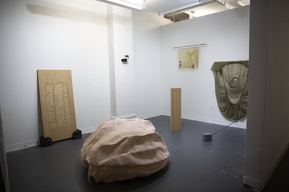   Attempts at transfiguring myself , 2022 (installation view), nylon, plasticine, steel, MDF, plastic cup, sponge, vinyl, variable dimensions 