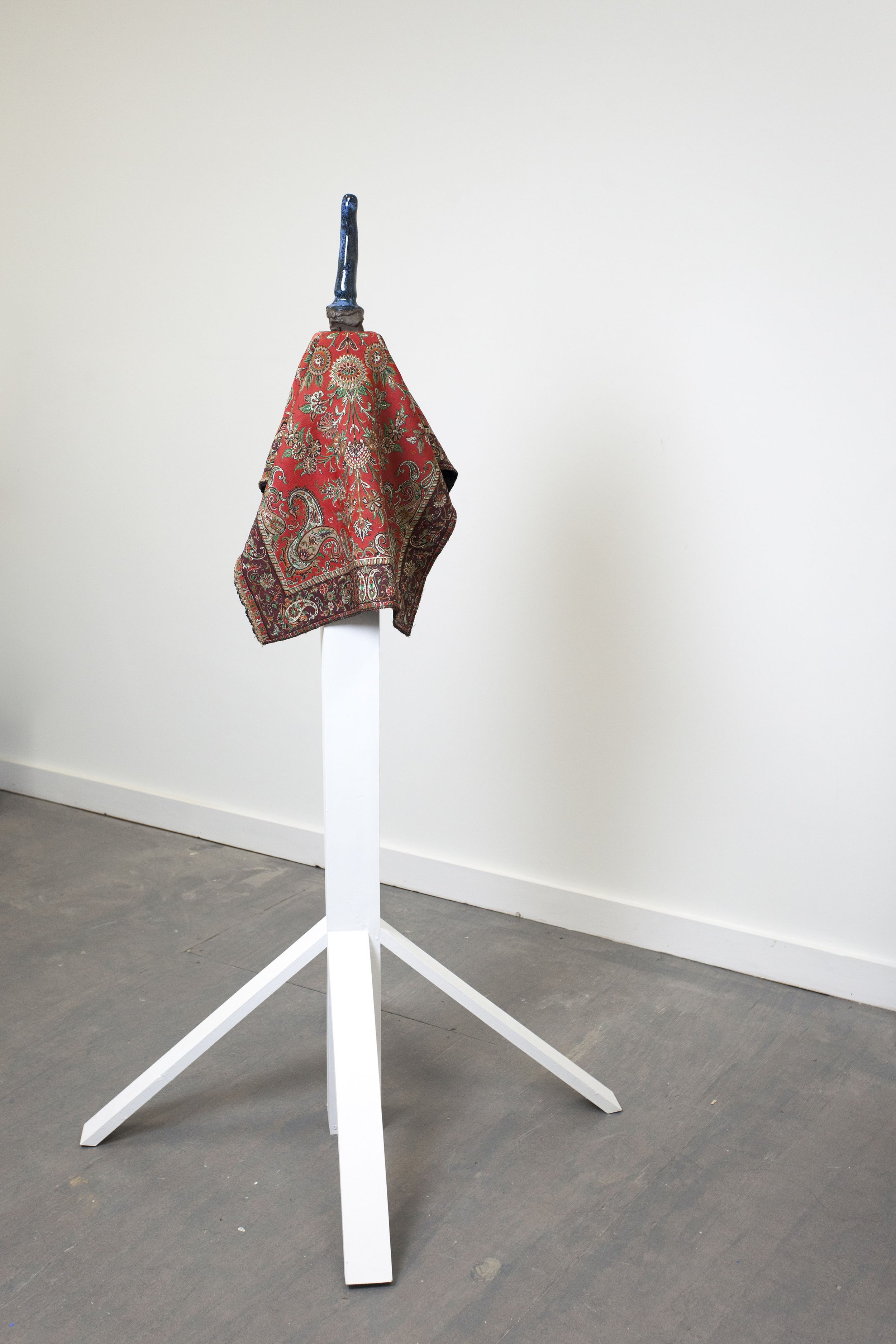   On four legs, from the home country , 2021, ceramic, wood and handmade Iranian tapestry, 35" x 35" x 56” 