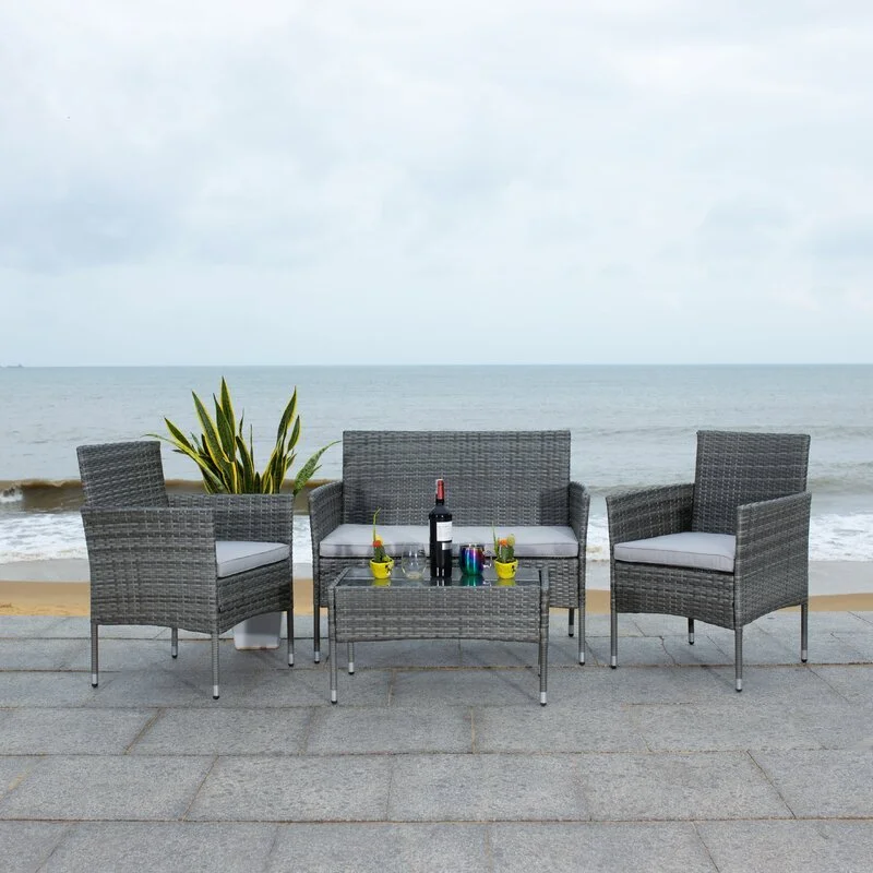 Hokendauqua+4+Piece+Rattan+Sofa+Seating+Group+with+Cushions.jpg