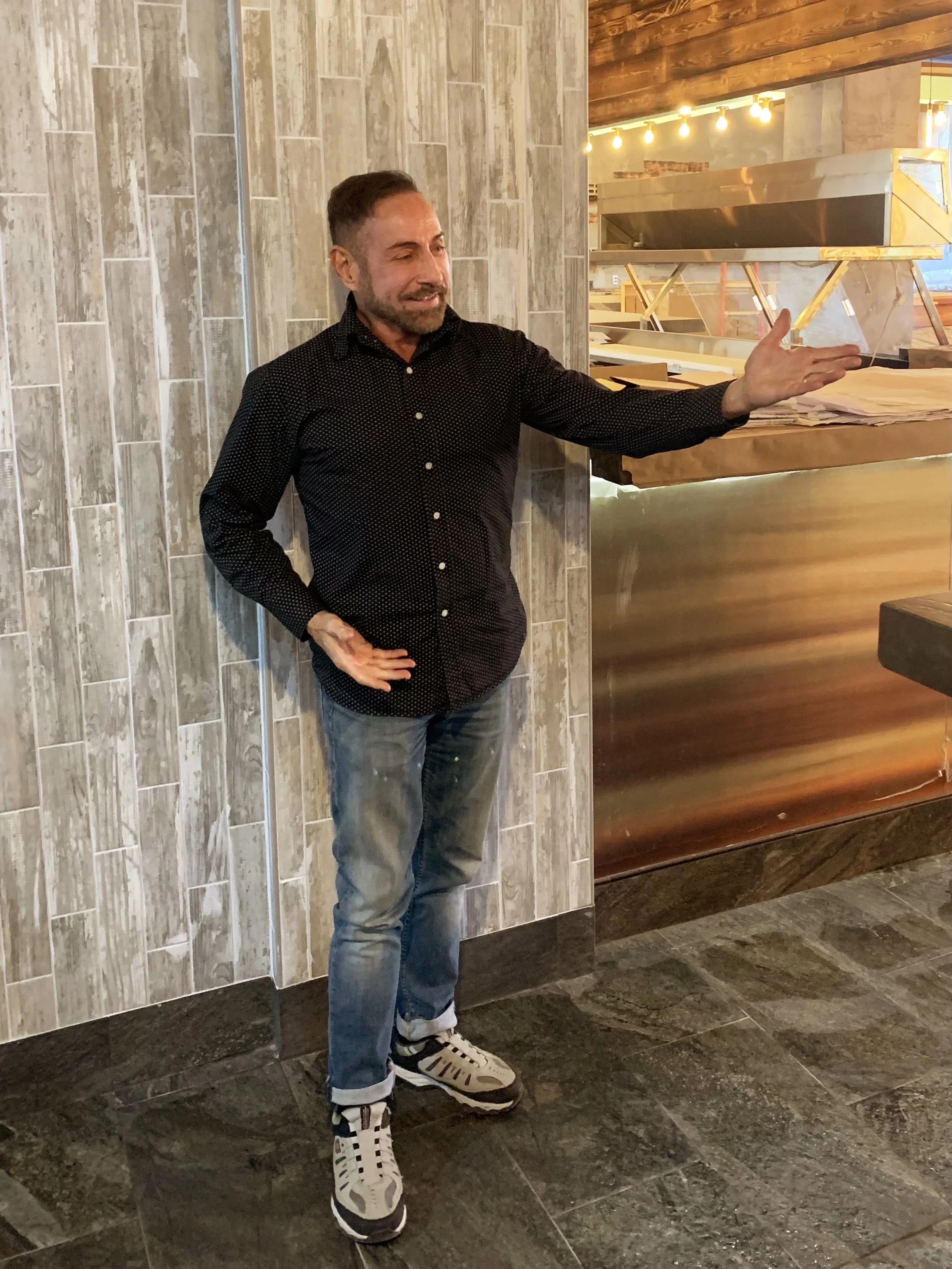 Raymond Haldeman displays a design element 