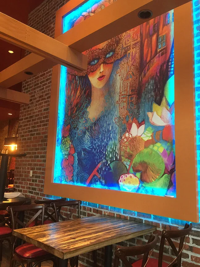 vibrant led illuminated mural by Raymond Haldeman the restaurant designer