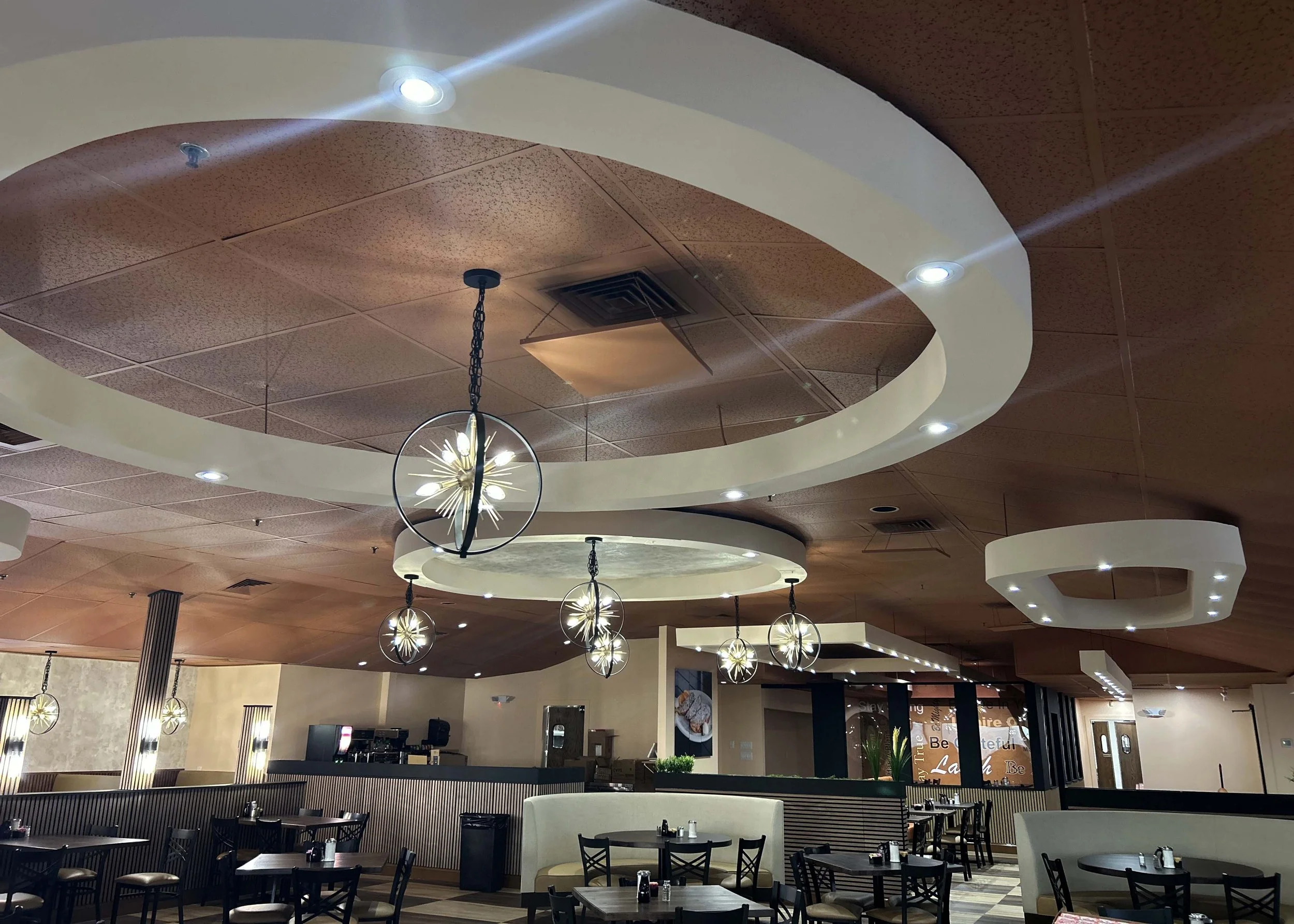 renovated restaurant with circular lighting soffits