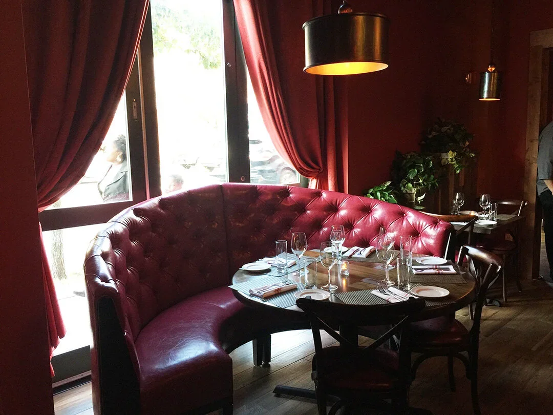 diamond tufted serpentine booth by restaurant designer Raymond Haldeman