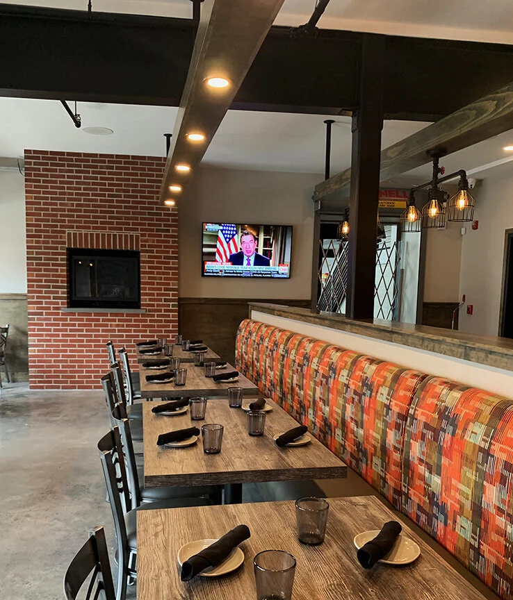 restaurant designer Raymond Haldeman displays his banquette design