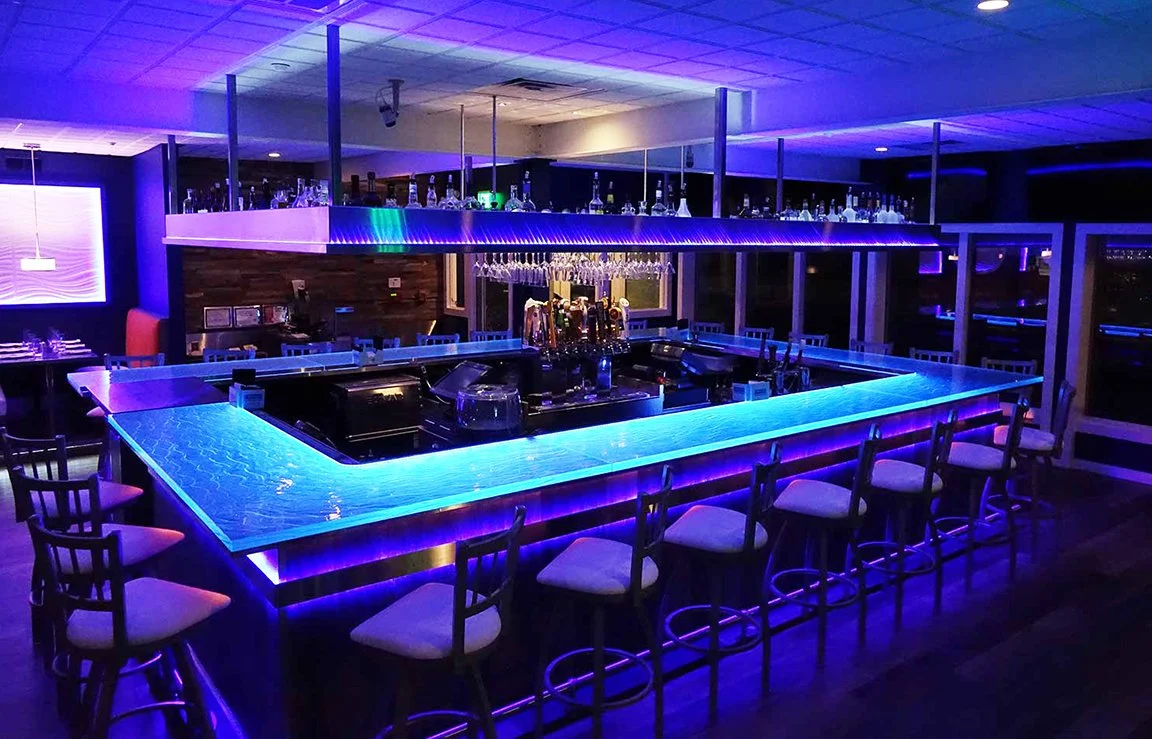 LED lit glass bar design in Fort Lauderdale