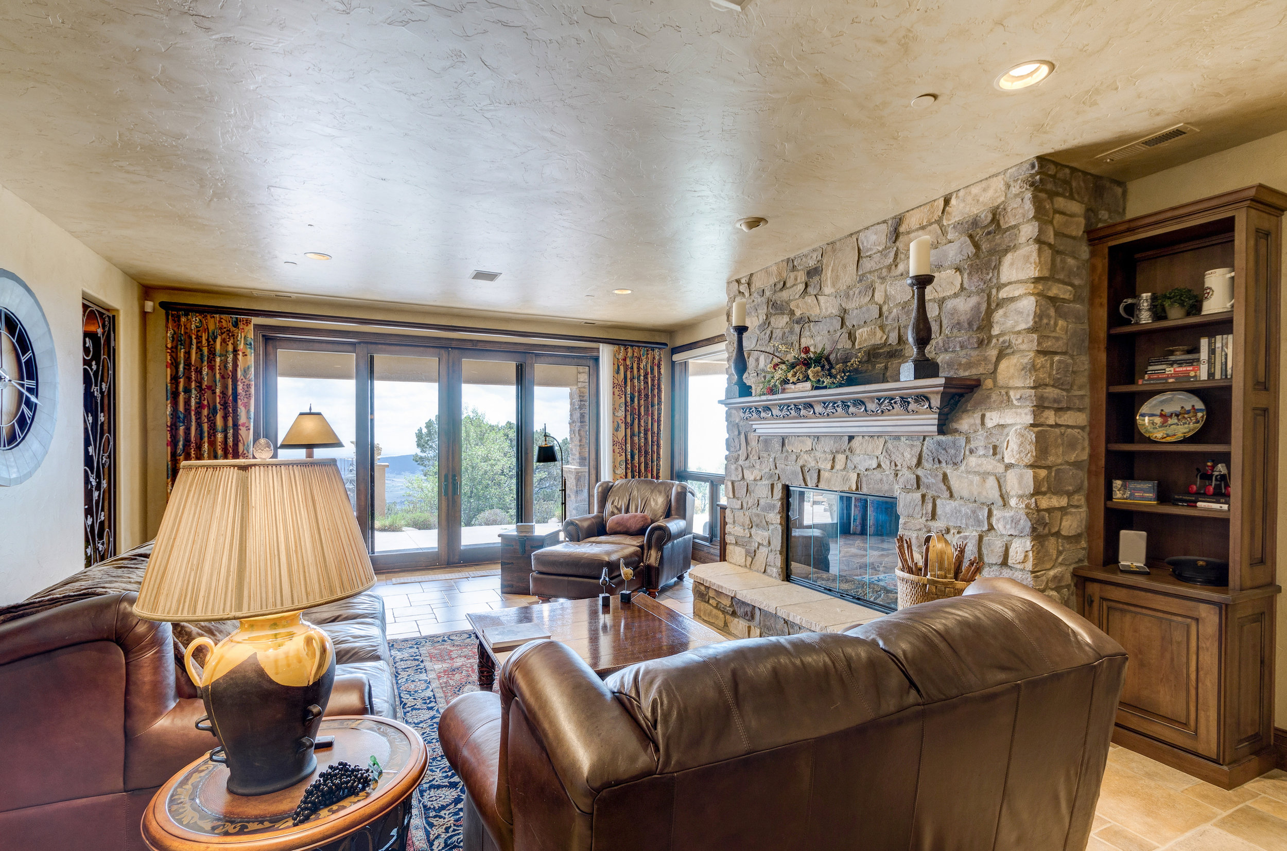 17-Family Room in Basement with wet bar and wine grotto.jpg