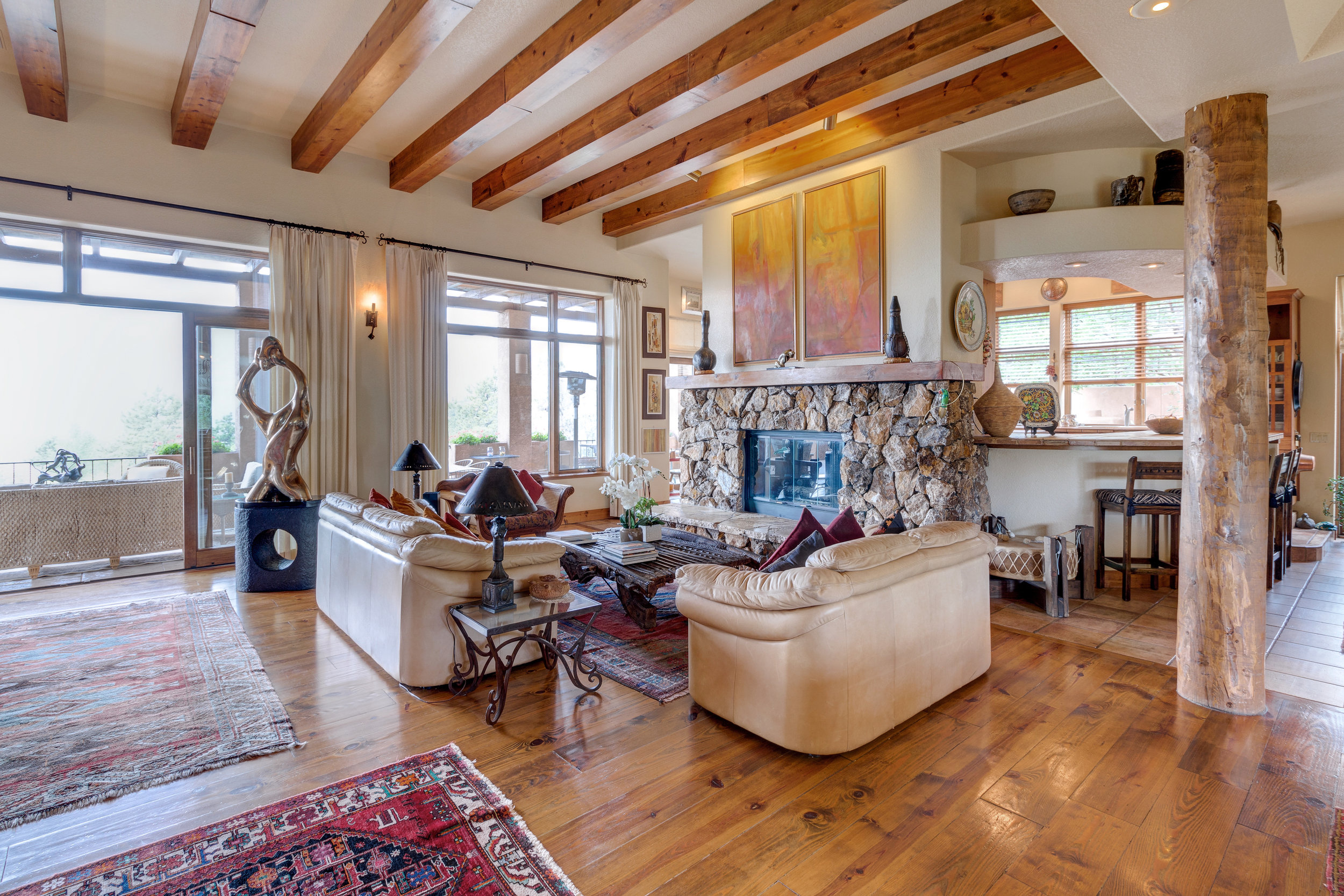 7-Main sitting area with natural colorado marble fireplace.jpg