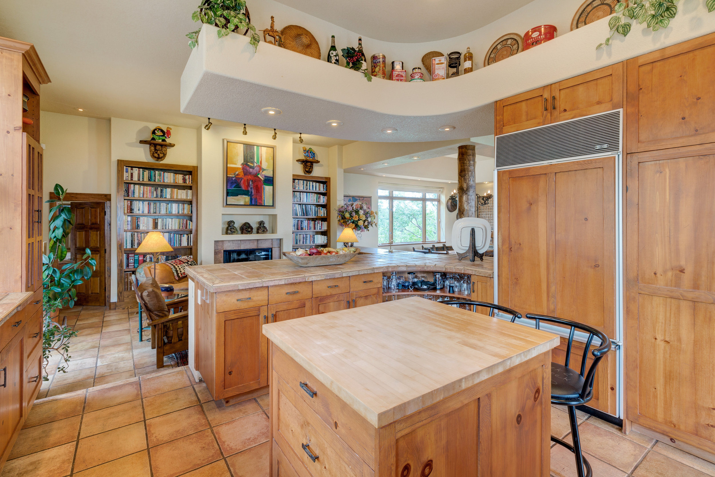 17-Kitchen overlooks hearth room.jpg