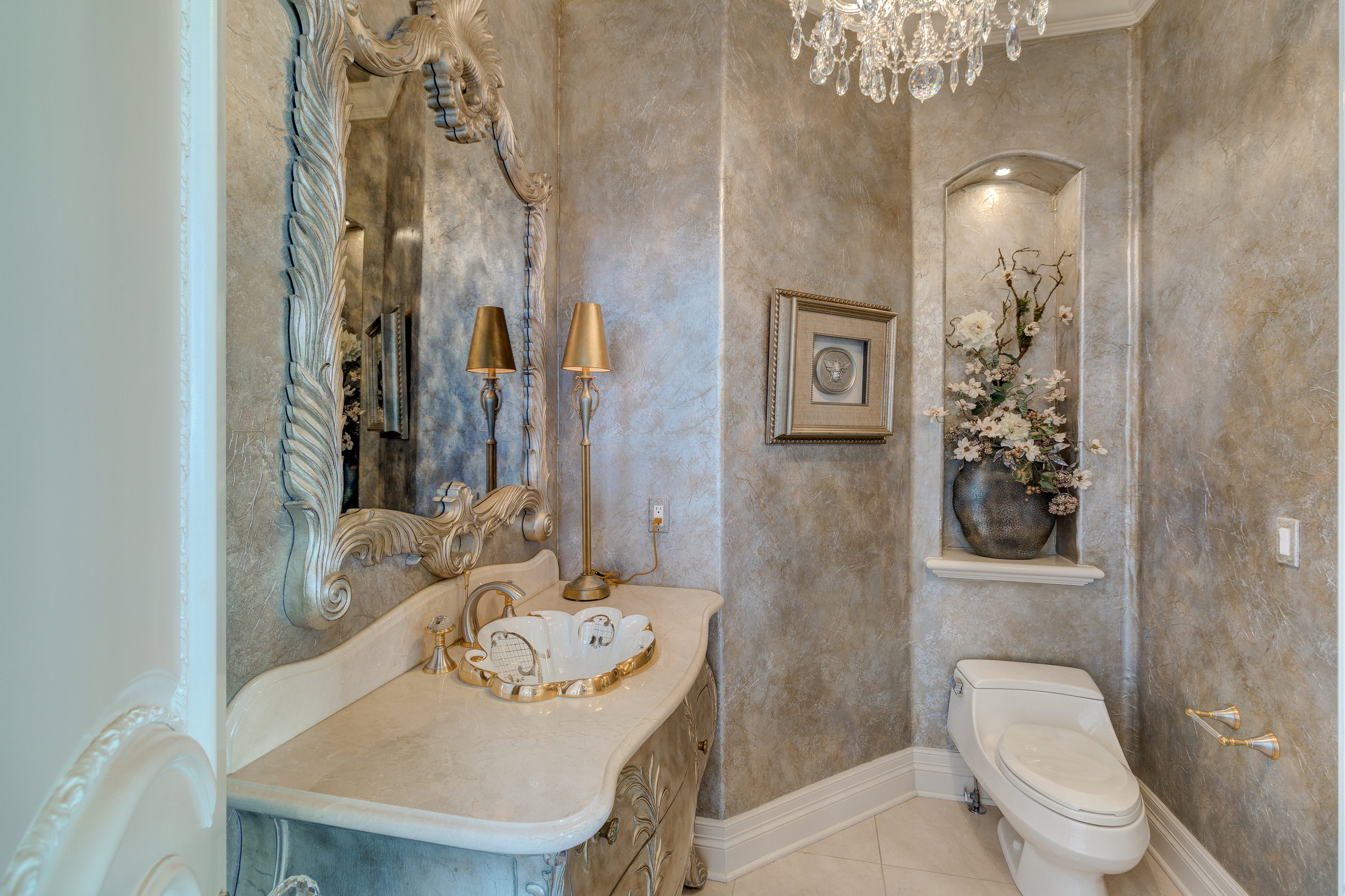 11-One of two powder rooms on main level.jpg