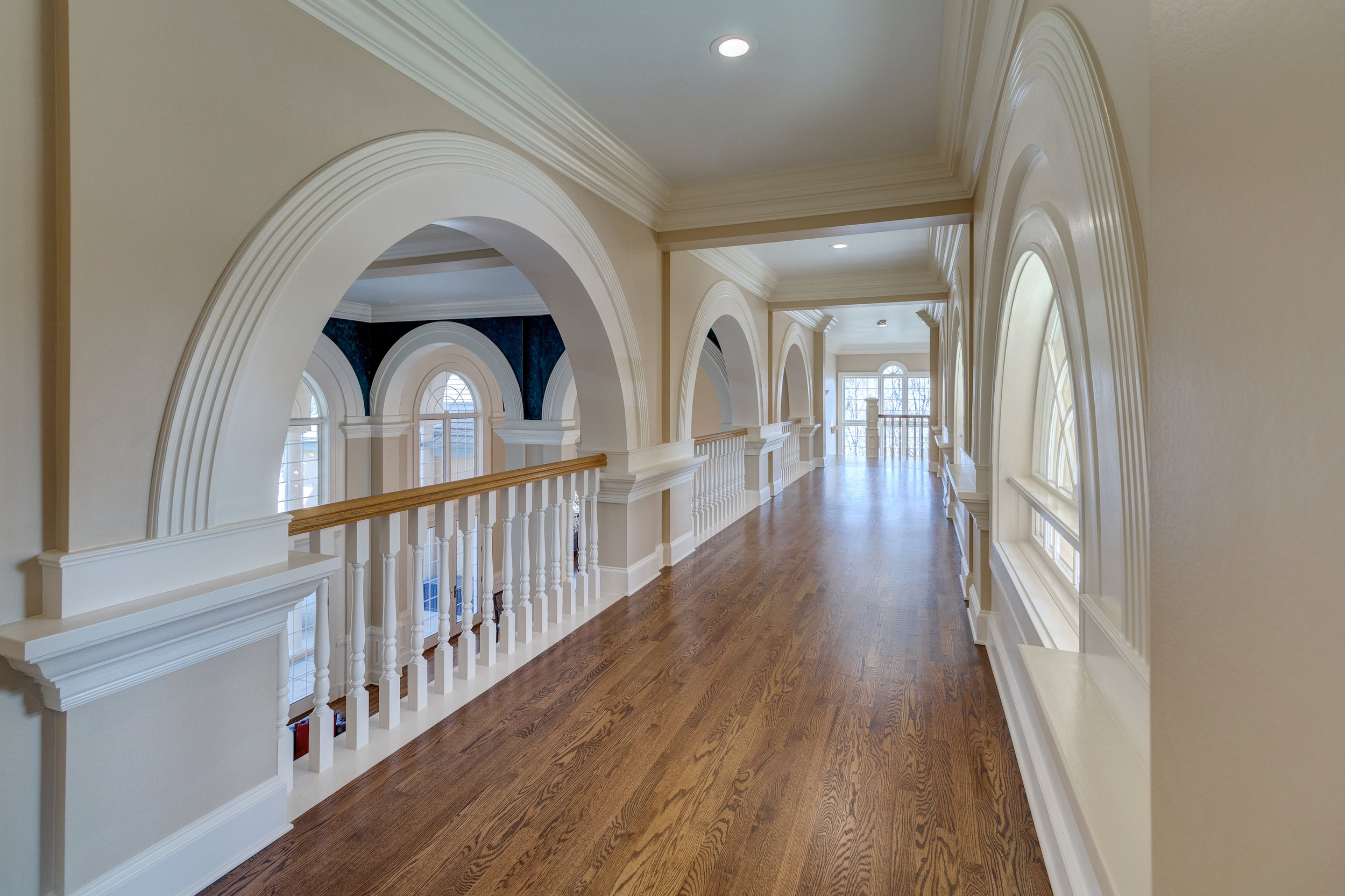 19-Upper level hallway with overlook to great room.jpg