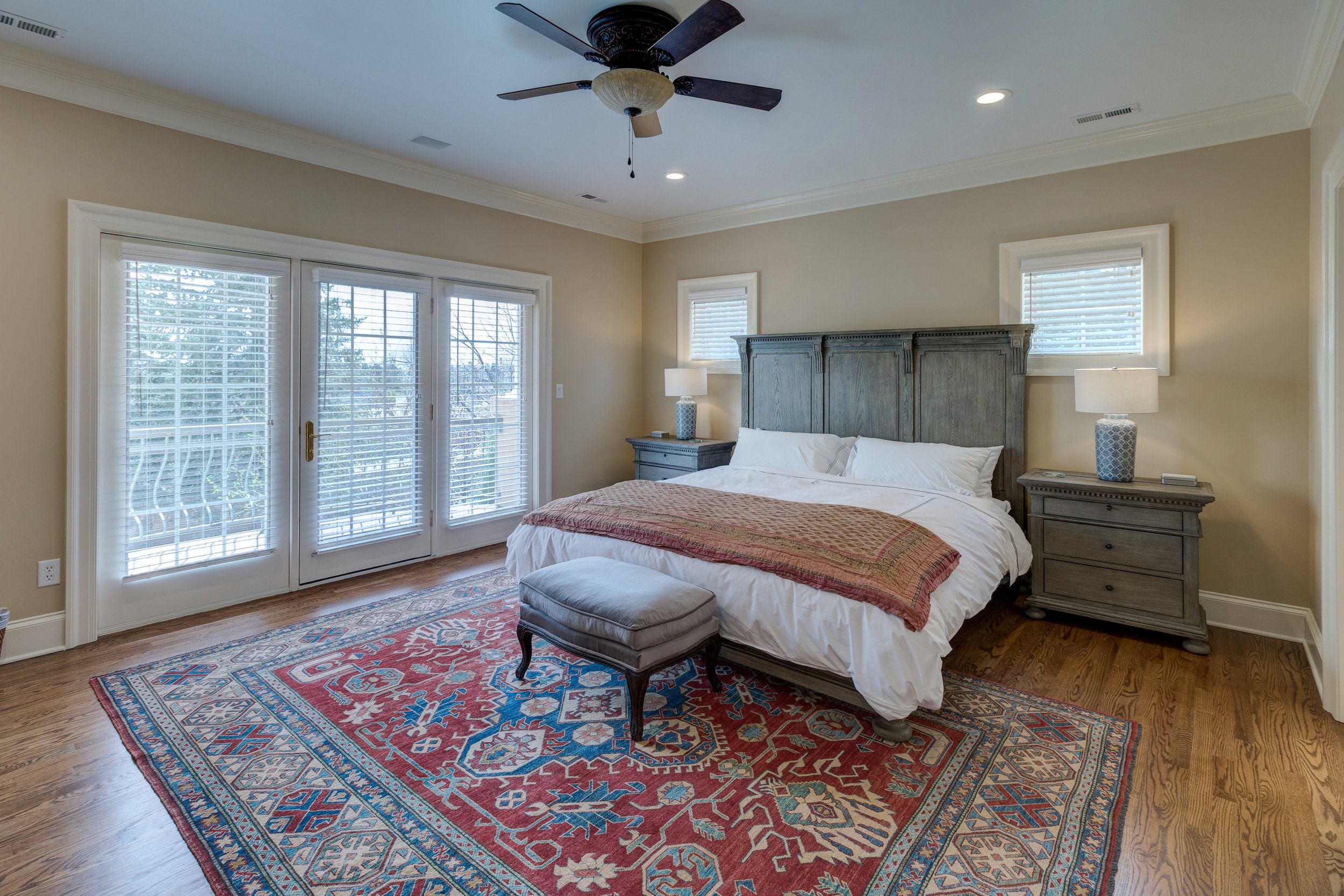 24-Upper level guest suite with private bath, walk-in and private patio.jpg