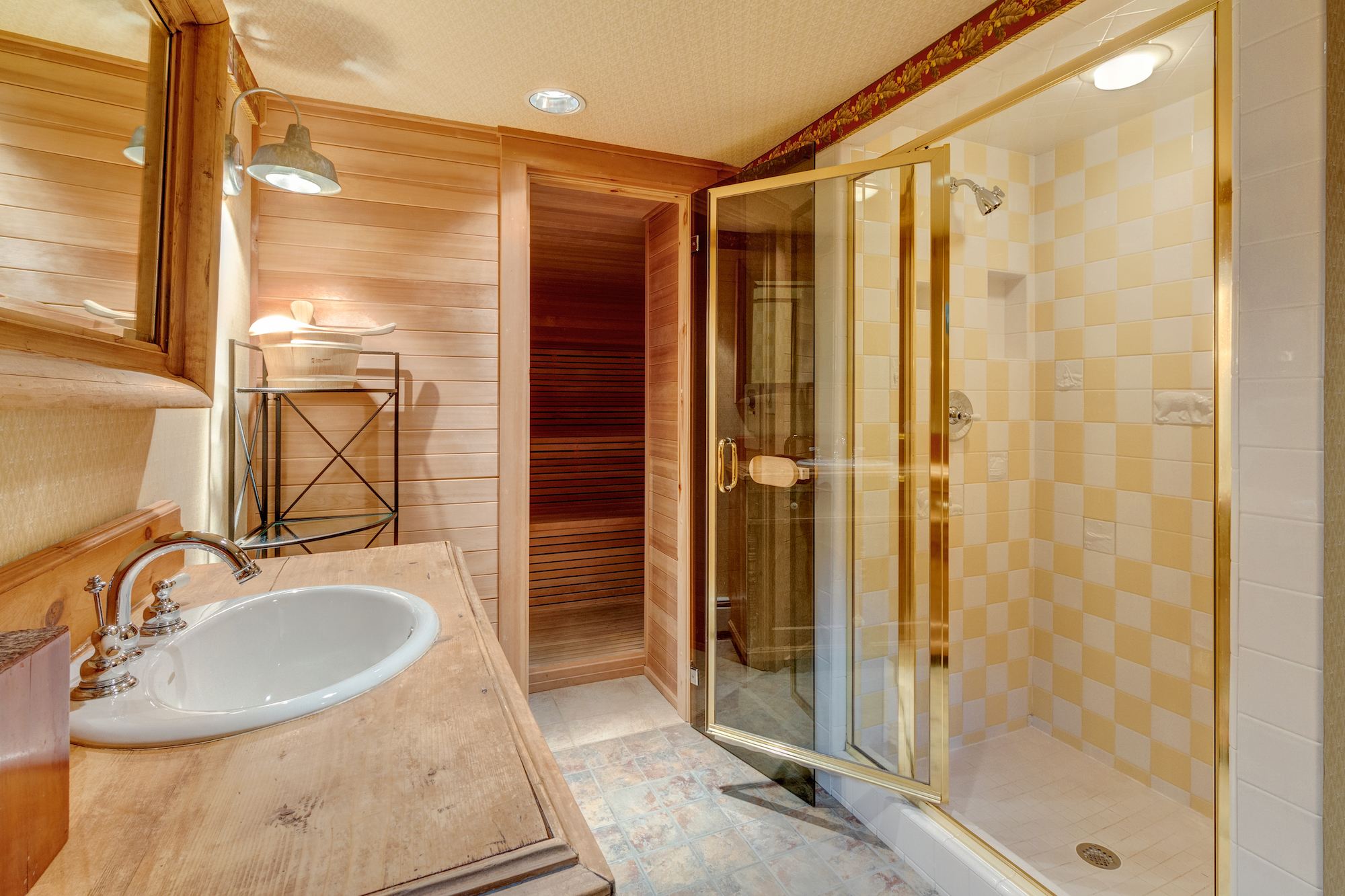 23-Lower level guest bath with shower and sauna.jpg