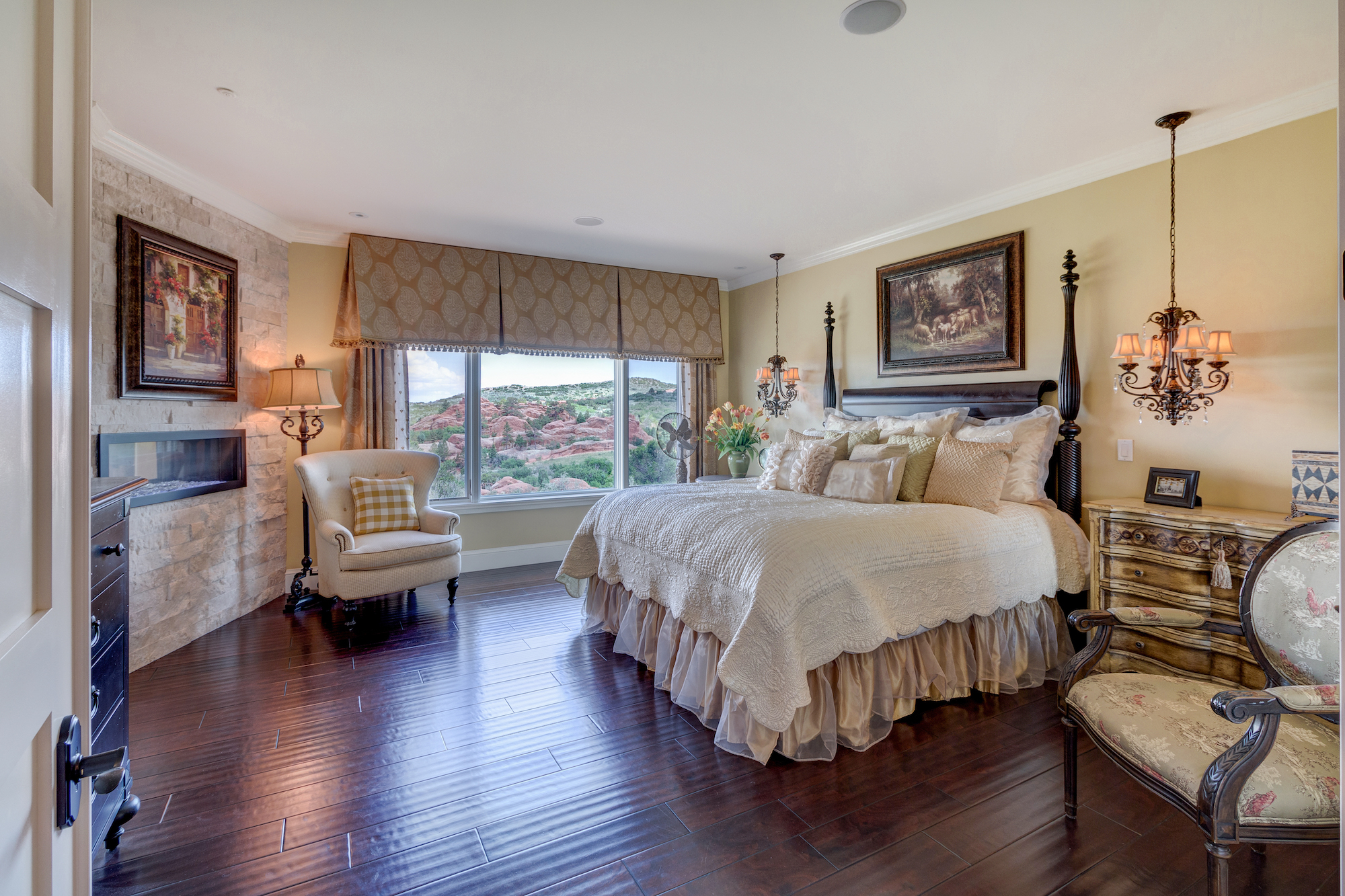 014-Master bedroom with fireplace that also opens to master bath.jpg