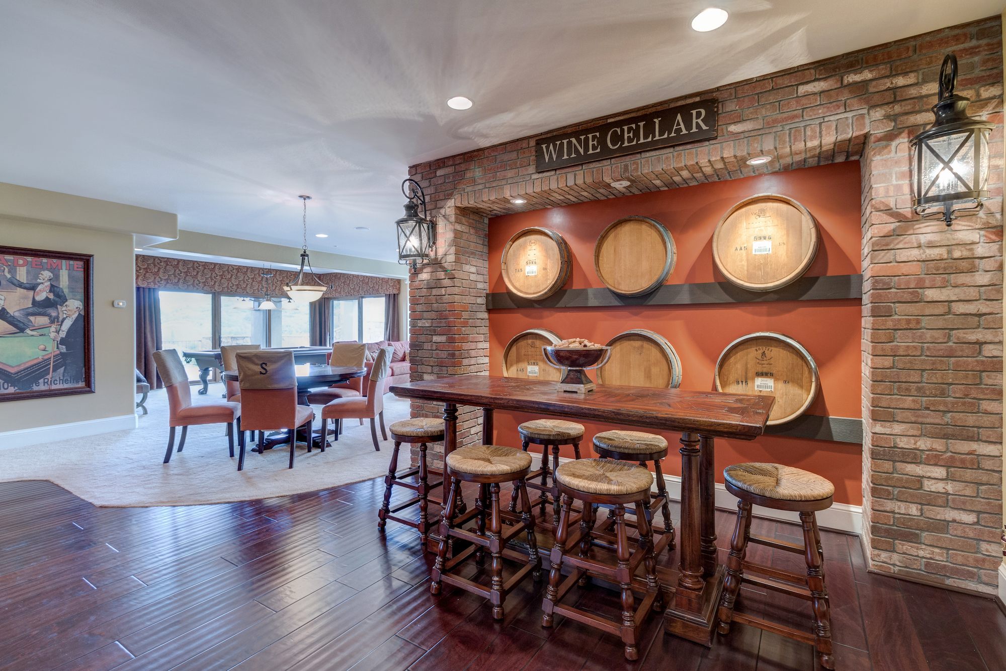 019-Family room in basement w wet bar and wine tasting area.jpg