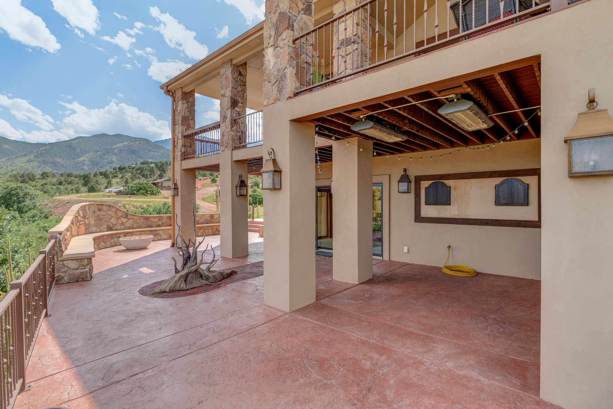 030-LL patio w 2 firepits and bit in stone bench.jpg